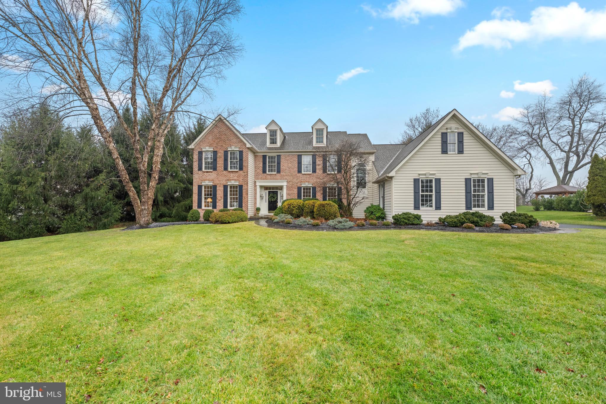 Welcome to this beautifully updated and meticulously maintained center hall Colonial in the highly sought after Kenmara subdivision of West Chester. With an unbeatable location and true move in ready condition, this spacious home offers the perfect blend of comfort, style, and convenience. Step inside to a welcoming center foyer with refinished hardwood floors. The entry is flanked by a sun filled living room and elegant formal dining room, while a short hall leads to a comfortable den and convenient first floor powder room. The heart of the home is the open concept kitchen and family room. The beautifully updated kitchen features a large center island, granite countertops, Century cabinetry with soft close doors and drawers, stainless steel Bosch appliances, a built in microwave, along with a stone tile backsplash.The adjoining breakfast area opens through sliding doors to a maintenance free Trex deck, perfect for outdoor dining and entertaining. The family room features vaulted ceilings and a dramatic wall of windows overlooking the backyard, creating a bright and inviting space. Just beyond the kitchen is the laundry room, a mudroom offering exceptional storage and interior access to the three car garage. Upstairs, the second floor features newer carpeting and four generously sized bedrooms, including a luxurious primary suite with a sitting area and four closets, two of which are walk in. The primary bathroom has been beautifully renovated and features dual vanities. The three additional bedrooms share a fully renovated hall bathroom provides stylish and functional space for family or guests. The unfinished basement offers approximately 1,400 additional square feet, ideal for future finishing as a home theater, gym, recreation space, or simply abundant storage. Enjoy an active lifestyle with tennis and pickleball just around the corner at East Bradford Park.Kenmara’s location is hard to beat, just minutes from downtown and ideally situated between Wilmington and King of Prussia. With convenient access to major highways including the Interstate 95 Corridor, you are within easy reach of Philadelphia, New York City, and Washington, DC. This is a rare opportunity to own a move in ready home in one of West Chester’s most desirable neighborhoods.