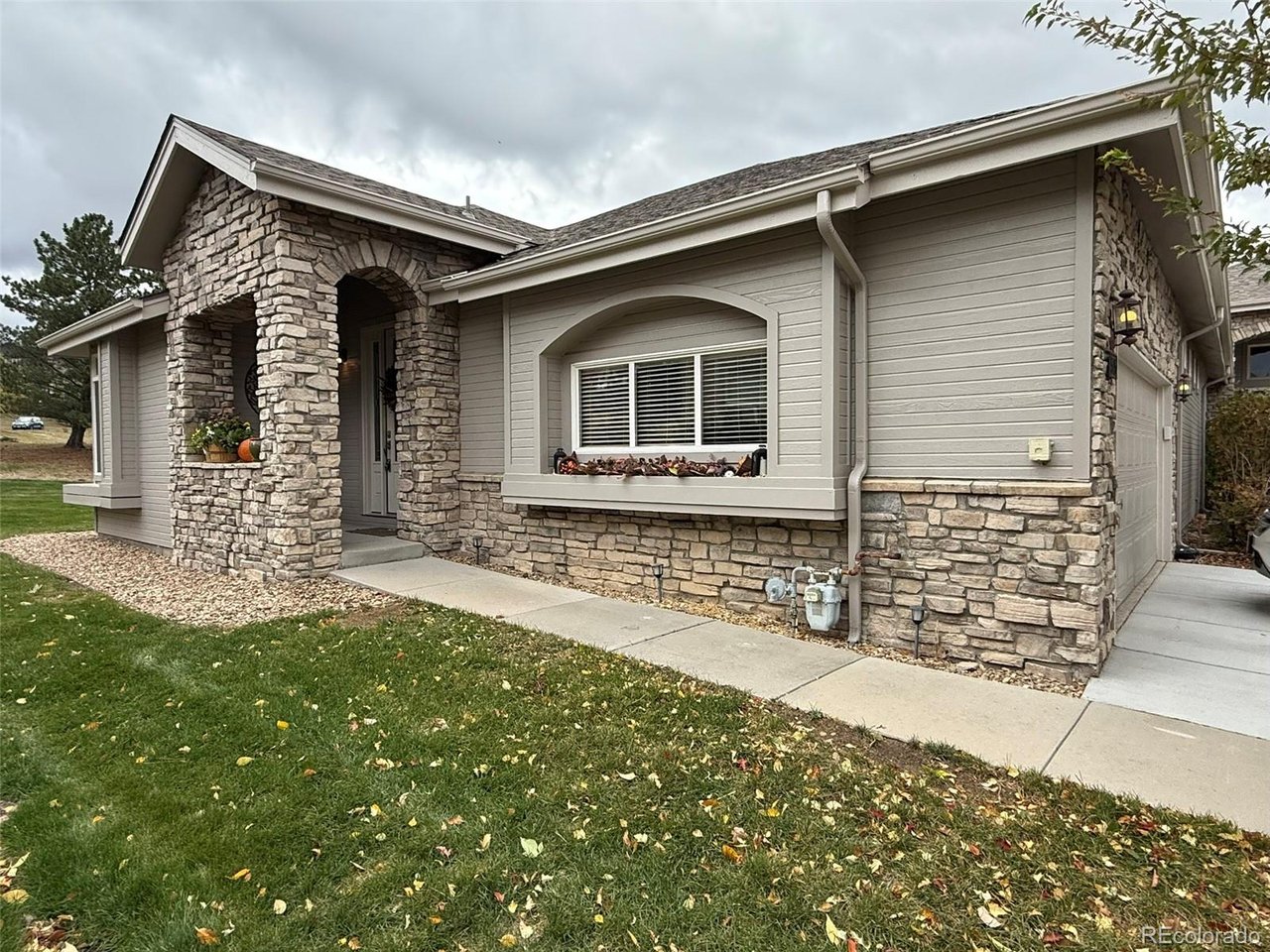 WELCOME HOME TO PLUM CREEK-WHERE LOW-MAINTENANCE LIVING MEETS THE BEST OF THE COLORADO LIFESTYLE! Tucked away on a quiet cul-de-sac in Castle Rock's desirable Fairway Vistas II community, this inviting home offers the perfect combination of comfort, convenience and location. Featuring 2 bedrooms, 2 bathrooms, a 2-car garage & an unfinished basement offering future possibilities. This home is designed for easy main-level living. Natural light fills the living spaces, while the spacious wraparound deck provides a wonderful setting for morning coffee, outdoor dining or simply relaxing by the neighboring greenbelt.NO METRO DISTRICT-A VALUABLE FINANCIAL ADVANTAGE! Enjoy the lower property taxes without the additional mill levies commonly associated with newer metro district communities.AND THE LOCATION IS SOMETHING SPECIAL! Golf enthusiasts will love having Plum Creek Golf Club & Red Hawk Ridge Golf Course nearby. Pickleball players will appreciate the four outdoor courts at beautiful Emerald Park, right in the Plum Creek area, offering a great place to stay active, meet friends & connect with the community. Castle Rock's extensive network of hiking & biking trails, parks & open spaces offer endless opportunities to enjoy the outdoors.Just minutes away, Philip S. Miller Park features recreation & activities for all ages, including scenic trails, the Challenge Hill staircase, adventure attractions, fitness facilities and seasonal concerts at its outdoor amphitheater. And don't overlook the charm of historic downtown Castle Rock, with its inviting restaurants, boutique shops, community gatherings, festivals and local entertainment.Whether you're looking to simplify your lifestyle, spend more time enjoying the outdoors, or simply find a welcoming community to call home, **515 Stafford Circle offers a wonderful combination of location, livability and lifestyle.** Discover why Plum Creek remains one of Castle Rock's most appealing established neighborhoods!