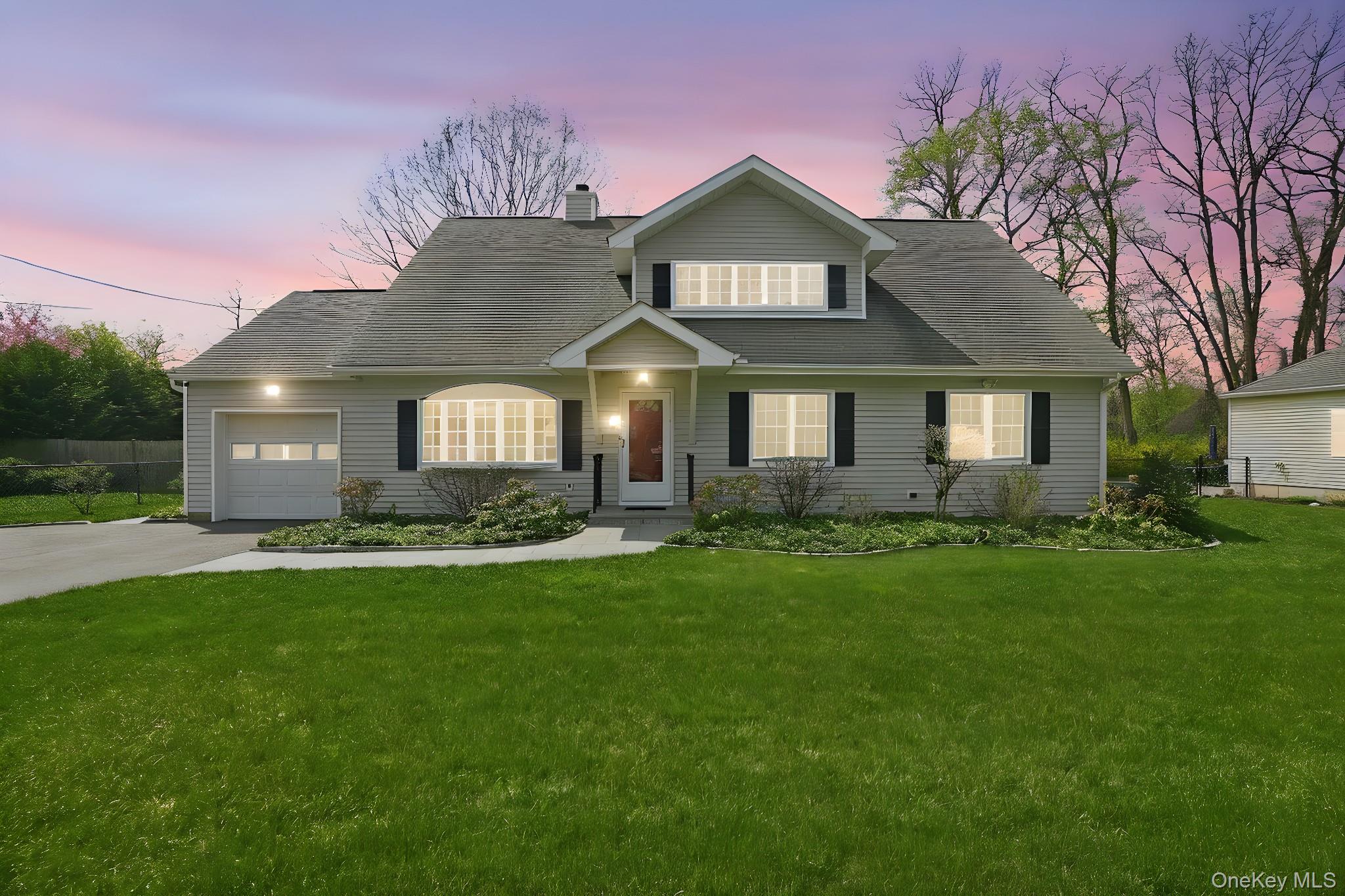 Welcome to 73 Sunset Road in Montrose, NY, a meticulously maintained 4-bedroom, 3 full bath home offering flexible living space, modern updates, and Hudson River western facing sunset views. The standout feature is the main-level primary suite with en-suite bath, perfect for today’s evolving lifestyles. Whether used as a private retreat, expansive entertainment room, or multi-generational living space, this area adapts to your needs with ease. The main level also features a dedicated home office area, a bright living room, and an updated large kitchen/dining room equipped with premium Bosch appliances including cooktop, wall oven, microwave, and dishwasher. Hardwood floors lie beneath the first floor carpeting, ready to be uncovered. A second full bath on this level adds convenience and functionality. Upstairs, you’ll find three generously sized bedrooms and a full hall bath, providing comfortable accommodations for all. Enjoy year-round comfort with central air conditioning, and appreciate the care given to major systems, including a recent above-ground oil tank. The spacious, clean basement offers excellent storage and includes a sought-after Speed Queen washer in the laundry area. Set on a level, nearly 3/4 acre property, the grounds feature manicured lawn with irrigation, custom plantings, a Azek deck, and a relaxing hot tub. Nestled along the Hudson River, Montrose offers a blend of history, nature, and community charm. Spend weekends exploring George's Island Park, a scenic 208-acre waterfront park with trails, wetlands, and river access. The area is home to the historic Hudson Valley Veterans Affairs Health Care System and the Hendrick Hudson Free Library, a local landmark since 1931. Commuters will appreciate the  2-mile proximity to the Cortlandt station, while history enthusiasts will recognize the area’s significance near Kings Ferry crossing.