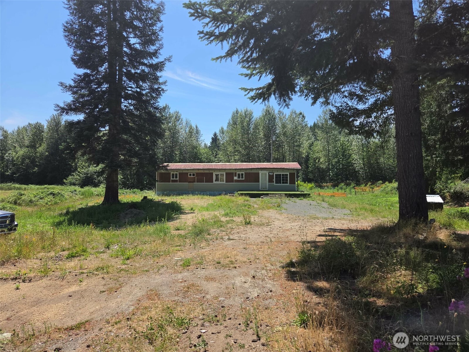 Experience the beauty of Pacific Northwest living on this exceptional 17.8-acre property in the heart of Randle. The updated manufactured home offers comfortable, move-in-ready living surrounded by peaceful countryside and breathtaking mountain views. Enjoy stunning vistas of Mount Adams to the south and Mount Kiona to the north, creating a spectacular backdrop year-round.Step outside to your own growing fruit orchard featuring apple, pear, peach, plum, and fig trees, offering both beauty and seasonal harvests. The expansive acreage provides endless opportunities for gardening, hobby farming, recreation, or simply enjoying the privacy and tranquility of rural living.Conveniently located near the Cowlitz River, Mount Rainier National Park, Gifford Pinchot National Forest, and White Pass Ski Area, this property is an ideal full-time residence, vacation retreat, or investment opportunity. Experience the best of country living with room to roam, incredible scenery, and abundant outdoor recreation just minutes away.