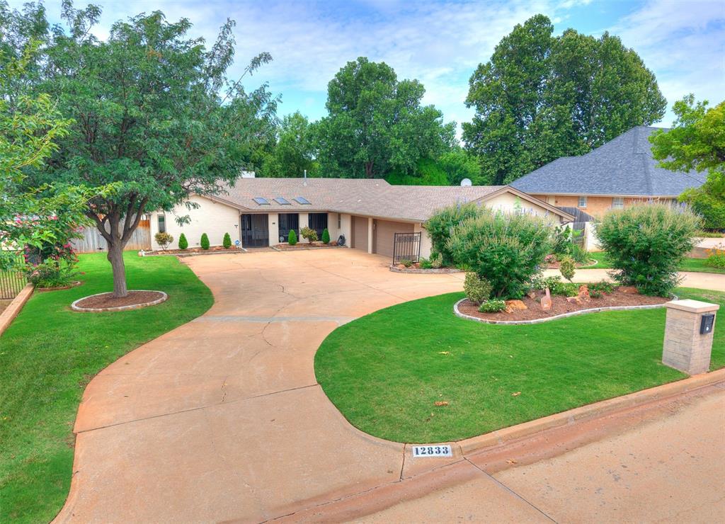 From the front court yard to the backyard, entertaining will be a breeze with the open spaces & doors that will open to create great flow while having friends & family over. The large dining room will fit just about any table you can imagine. The living room is a host/hostesses dream w/built-in entertainment cabinet for your large screen TV to fit perfectly over, fireplace & wetbar. The kitchen has ample storage w/pull out drawers in most all the cabinets, granite counter top, tile backsplash, double ovens, warming oven & more. Just off the kitchen is the laundry w/a half bath. In the primary suite you'll get patio access, double vanities, jacuzzi tub, full tile shower & walk-in closet. The secondary bedrooms are sized wonderfully & share a Jack-n-Jill bathroom w/walk-in closets & tile shower. Relax under the covered back patio in your privacy backyard w/large storm shelter. With a zoned H&A system, 2 hot water tanks, sprinkler system & generator  this home, situated in the desirable Quail Creek subdivision is a can't miss!
