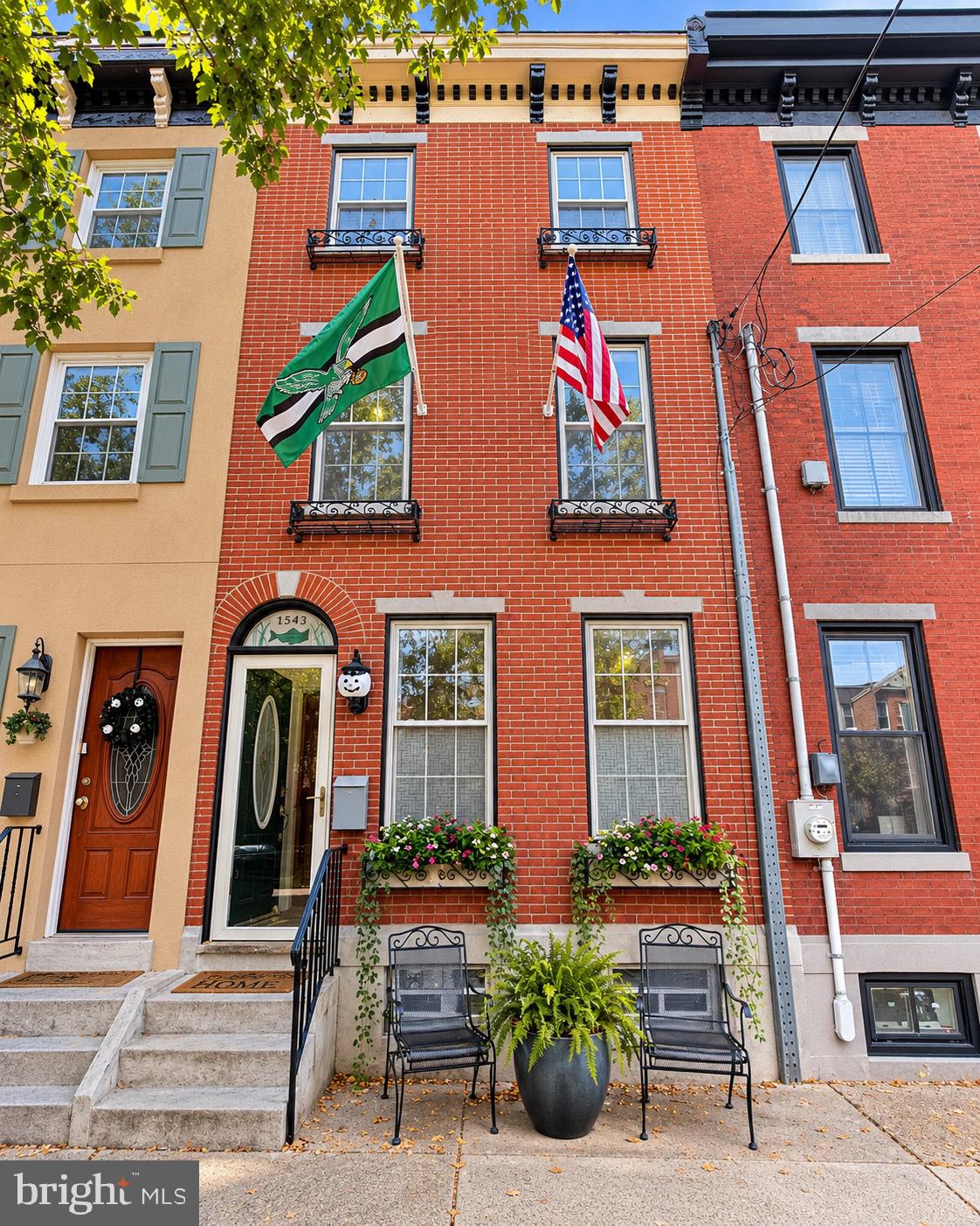 Welcome to 1543 E. Berks Street, where classic Fishtown charm meets modern comfort! Located in the heart of one of Philadelphia’s most vibrant neighborhoods, this beautifully maintained, three-story brick-front rowhome offers 4 spacious bedrooms, 2 oversized full bathrooms, and 2 private outdoor terraces with fantastic city views. Step inside to a bright and inviting main level featuring beautiful hardwood floors, fresh paint, and an open layout perfect for everyday living and entertaining. The updated eat-in kitchen boasts brand-new quartz countertops, a stylish backsplash, ample cabinetry, and plenty of space to gather. The second and third floors feature brand-new carpeting, generously sized bedrooms, and two exceptionally spacious full bathrooms with oversized soaking tubs and attractive tile finishes. Enjoy your morning coffee or unwind after a long day on either of the two private rear terraces overlooking the city skyline. The clean, dry, unfinished basement provides a dedicated laundry area and plenty of additional storage space. Just steps from Fishtown’s popular restaurants, cafés, breweries, shops, and entertainment, with convenient access to public transportation, major highways, and Center City Philadelphia. Freshly painted, thoughtfully updated, and move-in ready, this home offers the perfect combination of space, character, and location. Schedule your private showing today!