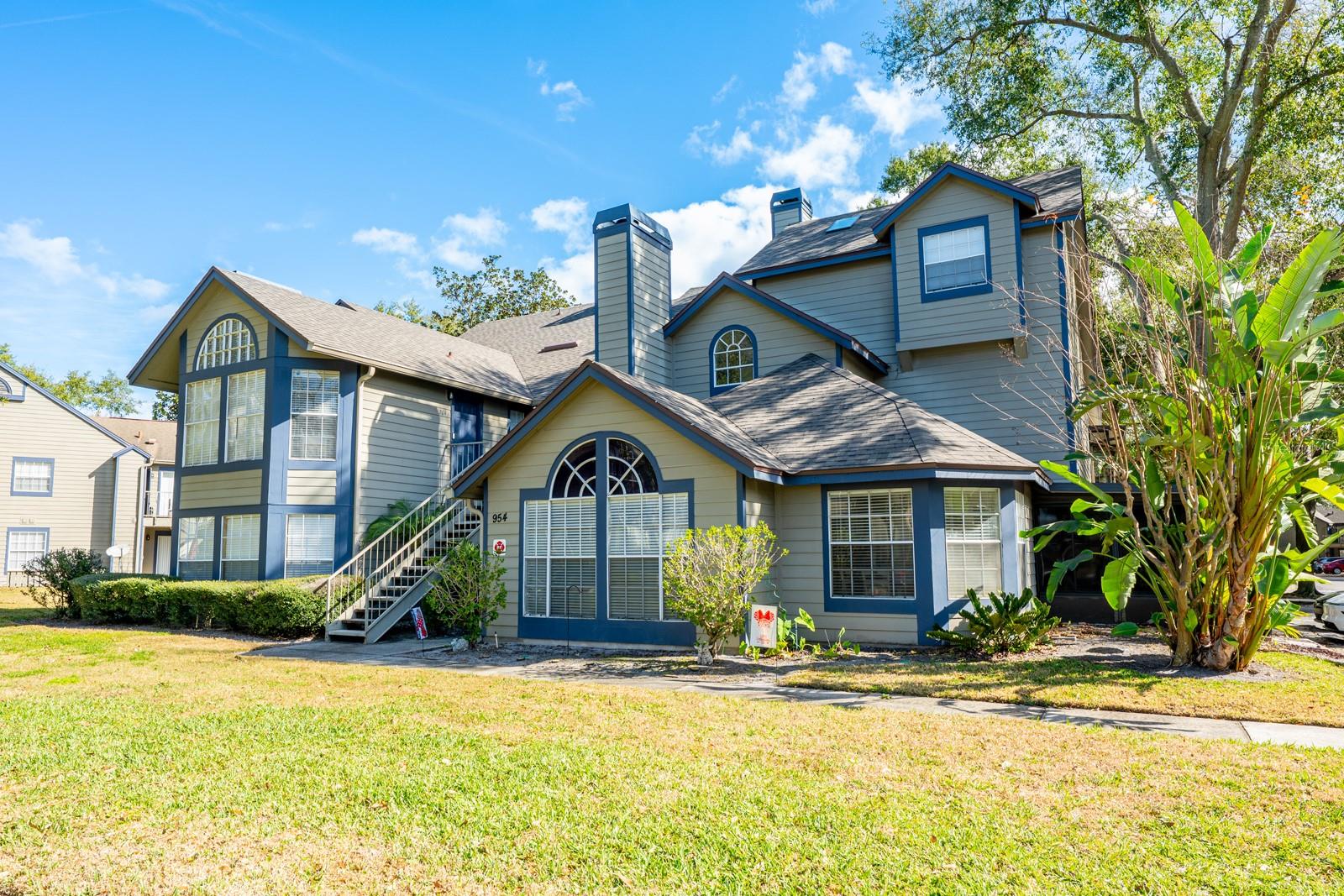 Ask about a lender provided RATE BUY-DOWN CREDIT on this home! ***Welcome to easy, LOW MAINTENANCE LIVING in this beautifully updated FIRST FLOOR condo ideally situated inside the park-like Hidden Village community of Lake Mary! With LUXURY VINYL PLANK flooring throughout and an UPDATED A/C (2019), this MOVE-IN READY home shows exceptionally well and delivers comfort, style, and convenience from the moment you step inside. This CORNER UNIT is filled with NATURAL LIGHT thanks to an abundance of windows, while VAULTED CEILINGS and an OPEN CONCEPT living and dining area create a bright, airy feel. The living room is anchored by a cozy FIREPLACE, adding warmth and charm, and French doors off the third bedroom lead out to a SCREENED LANAI – the perfect spot to unwind and enjoy the peaceful surroundings. The UPDATED KITCHEN features ALL NEW stainless steel appliances (2023), granite countertops, pantry storage, and a breakfast bar that seamlessly connects to the main living space. A convenient in-unit LAUNDRY CLOSET, three bedrooms, and two full baths offer a flexible layout ideal for everyday living, guests, or a home office setup. Residents of Hidden Village will enjoy the lovely mature landscaping, COMMUNITY POOL, and tranquil, well-maintained setting – all just minutes from 417, I-4, and Lake Mary Boulevard for easy access to shopping, dining, and anything else you could need or want. Stylish, updated, and perfectly positioned, this first-floor condo is a standout opportunity in one of Lake Mary’s most desirable locations. Call today to schedule a tour and fall in love with your new HOME SWEET HOME! ***Seller may consider buyer concessions if made in an offer***