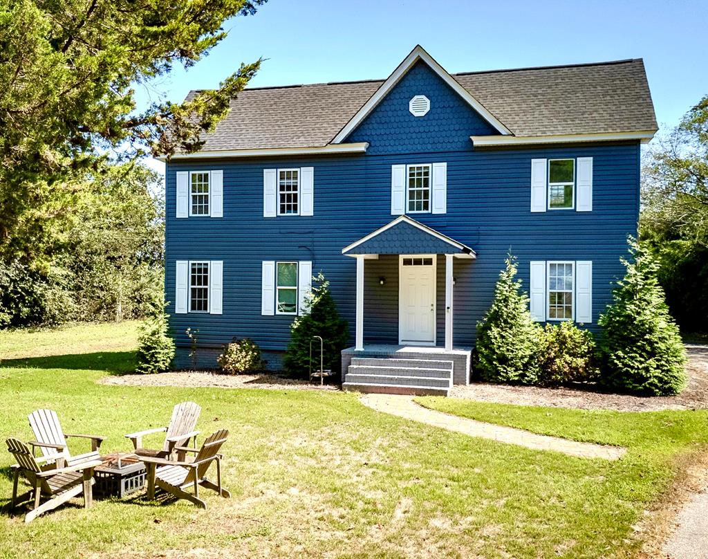 Renovated 1900s farmhouse on 2.84 acres just minutes from the town of Cape Charles and the Chesapeake Bay Bridge-Tunnel. Currently configured as a duplex, this property is perfect for rental income, short-term rental investment, or multi-generational living. A circular driveway leads to two spacious units, each offering 3 bedrooms, 2 baths, renovated kitchens, living rooms, laundry, and sunlit interiors. Updates include new HVAC systems, roof, windows, decks, exterior stairway, and remodeled baths, while restored original hardwood floors showcase the home's historic charm. Proven short-term rental history adds income potential or flexibility for use as a private residence with guest accommodations.