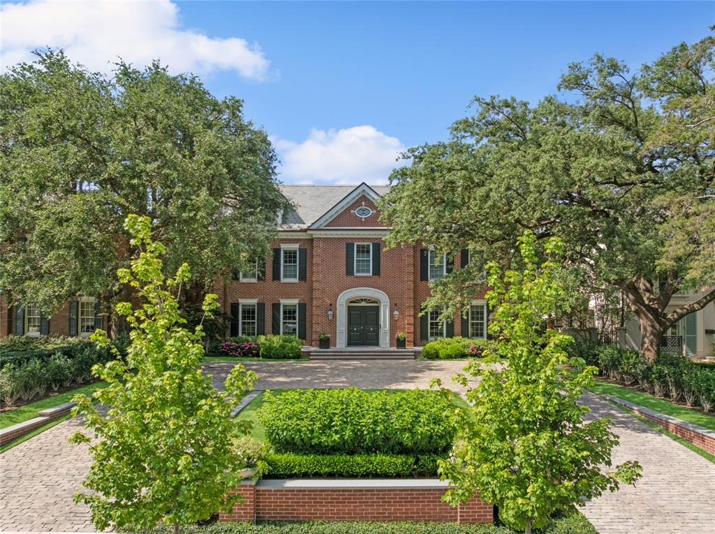 Timeless Georgian custom home spanning 6,608 SF on a generous 0.34-acre lot. The property was completely reimagined in 2023 by architect Jerry Coleman, builder Barringer Custom Homes, renown designer Marie Flanagan, and landscape design by Clint Horticulture. Entry is flanked with formals; LR to the left & DR on right, showcasing hand-painted De Gournay wallpaper & intricate plaster ceiling detail. The state-of-the-art kitchn feats custom cabinetry & brass shelving, oversized Rosso Levanto marble island, & La Cornue range. The bfast rm has stone FP & floor-to-ceiling boxed windows, opening to outdoor loggia w motorized screens & attached grill. Study opens to a lovely side patio. The red lacquered library is a standout, w beautiful custom millwork, & a burnished brass FP surround. The 2nd flr boasts 4 ensuite bedrms. Primary bedrm w dark wood paneling, separate primary bathrms, walk-in-closets w custom storage, and an inviting sitting rm that boasts a gas FP & overlooks backyrd for a serene retreat. The 3rd level transforms into a game rm, complete w a wet bar, a day bed, & half bath. The detached 3car gar & 1,415 SF guest quarters were completely rebuilt in 2023 in a New England-style architecture w cedar shake shingle exterior. The 1st floor offers a living space w a hidden Murphy bed, kitchen, & full bathrm. Upstairs, an office w built-ins, hidden half bath, & fitness rm. The impressive 3-car garage was developed w the flexibility to also function as a sport court or gym, w gorgeous wood paneling, gym floor w basketball & pickleball courts, & full climate cntrl. The expansive landscaped backyard is a serene retreat w lush greenery, and turfed yard. A shaded pergola with outdoor living area overlooks a separate spa w heater & chiller, and a walk-in cold plunge pool. Unique highlights include a movie screen projector, indoor-outdoor speakers w surround sound, generator, & putting green!