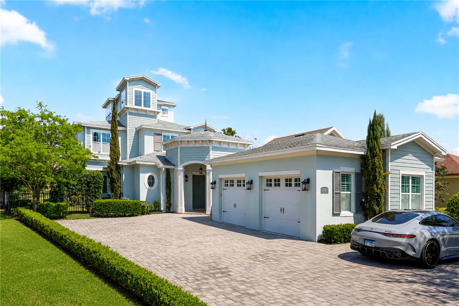 One of Reunion Resort's most iconic and desirable homesites, and one of its most distinctive homes to match.A 3-story residence on a rare oversized side yard lot, with panoramic golf course views that rank among the finest in Central Florida. From the open main floor to a spectacular third-floor crow's nest, the views travel with you at every level, an elevated perch unlike anything else in the community.The main floor is designed for easy, stylish living. A bright open-concept layout connects the living area, gourmet kitchen, and breakfast nook with custom built-in bench seating, with a built-in outdoor grill just steps away, perfect for indoor-outdoor entertaining. Two private bedrooms with ensuite bathrooms and a powder room complete the ground floor. Upstairs, three more ensuite bedrooms provide comfort and privacy for family and guests, alongside a generous game room with pool table and its own powder room. Built-in bunk beds make this an instant favorite for families and younger guests.Outside, a resort-style pool and spa overlook the fairways, with a poolside half bath and outdoor shower for effortless outdoor living. On clear evenings, Disney fireworks light up the sky from the backyard.Six bedrooms, all ensuite. Two full laundry rooms, one on each floor. Custom built-ins throughout. Designer furnishings included. Fully move-in ready from day one.Located in renowned Reunion Resort, minutes from world-class golf, dining, shopping, and Central Florida's top attractions. Exceptional as a primary residence, luxury vacation home, or investment property.This property does not currently convey with a Reunion Resort Club membership. Buyers interested in membership are encouraged to contact Reunion Resort directly to confirm current availability and policies.