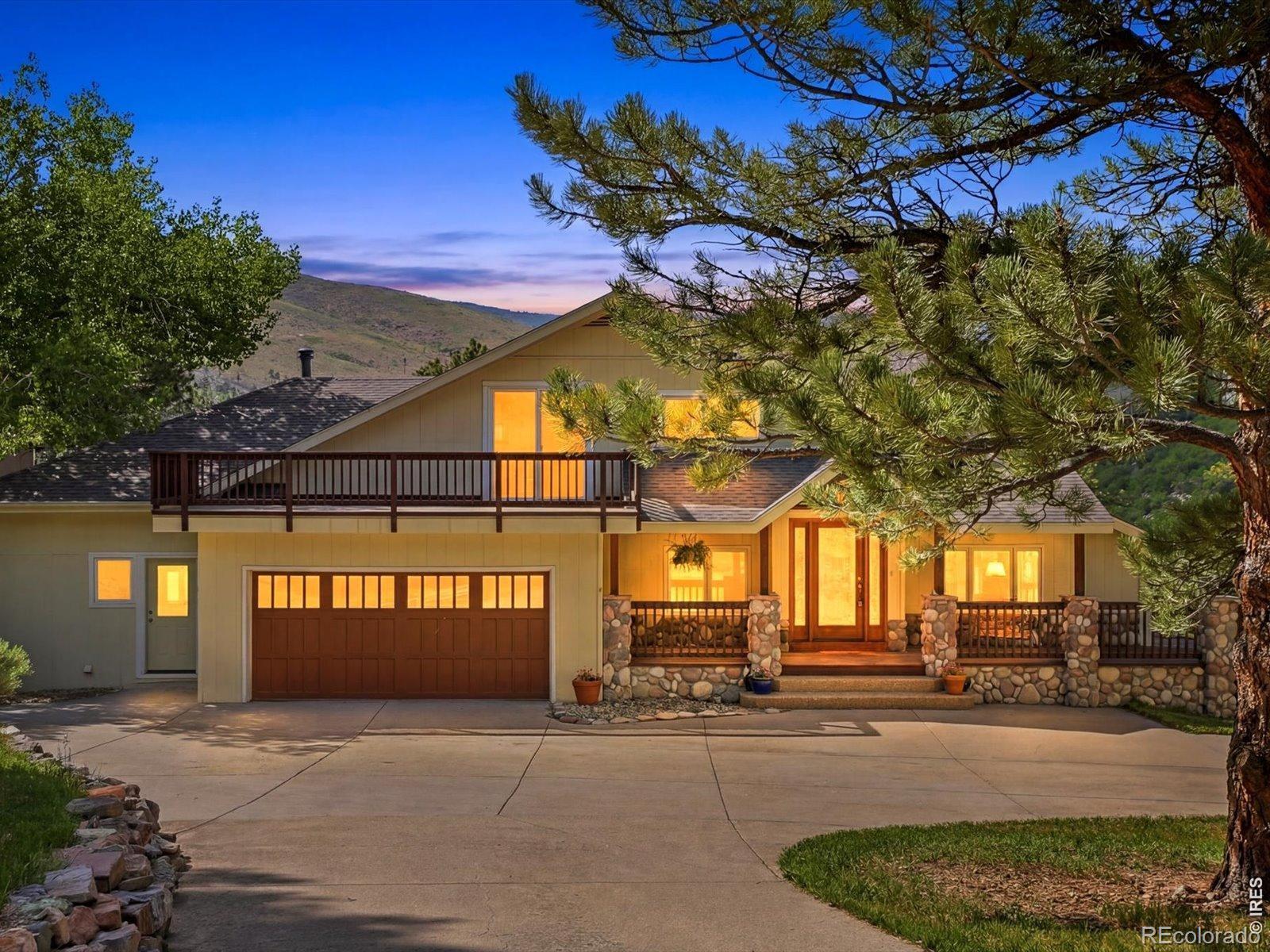 This exceptional property is settled into the foothills minutes north of Boulder, offering breathtaking views and stunning Colorado vistas. Set within a welcoming, community-oriented neighborhood. Just a short drive off the main road, but far enough to feel the peace and serenity of the mountains. Meticulously maintained and cared for!Main level boasts a spacious living room and a dining area with exceptional views, abundant natural light, and double doors leading to the wraparound deck. The kitchen is highly functional and open with gorgeous soapstone counter tops, double oven and beautiful wood floors. Off the kitchen is the sitting room which could alternatively serve as a formal dining area opening to the beautiful flagstone patio, offering excellent space for entertaining and overlooking a rare, flat backyard. The property has a current wildfire mitigation certification. The edge of the backyard overlooks Lefthand Creek meandering below.The family room offers flexible space for an office, game room or meditation room, with skylights and floor to ceiling windows. Enjoy easy access from the two car attached garage, straight into the mud/laundry room, which includes a convenient storage area and cedar closet. With one bedroom and full bath on the main level, head upstairs to a second bedroom with breathtaking views and its own private bath. The spacious primary suite rounds out the second floor with 2 walk-in closets, a 5 piece bath and a slider leading to your own private balcony.Don't miss the two car detached garage, with windows and skylights providing plenty of light for use as a workshop or for storing mountain toys or additional vehicles.Artisan stonework in and out gives a solid reminder of Colorado. Other features include: new roof Class 4 shingles (11/2025), solid wood doors, water softener, reverse osmosis, fresh paint and new carpet throughout. Separate furnace and A/C for the main floor and upstairs (serviced regularly.)
