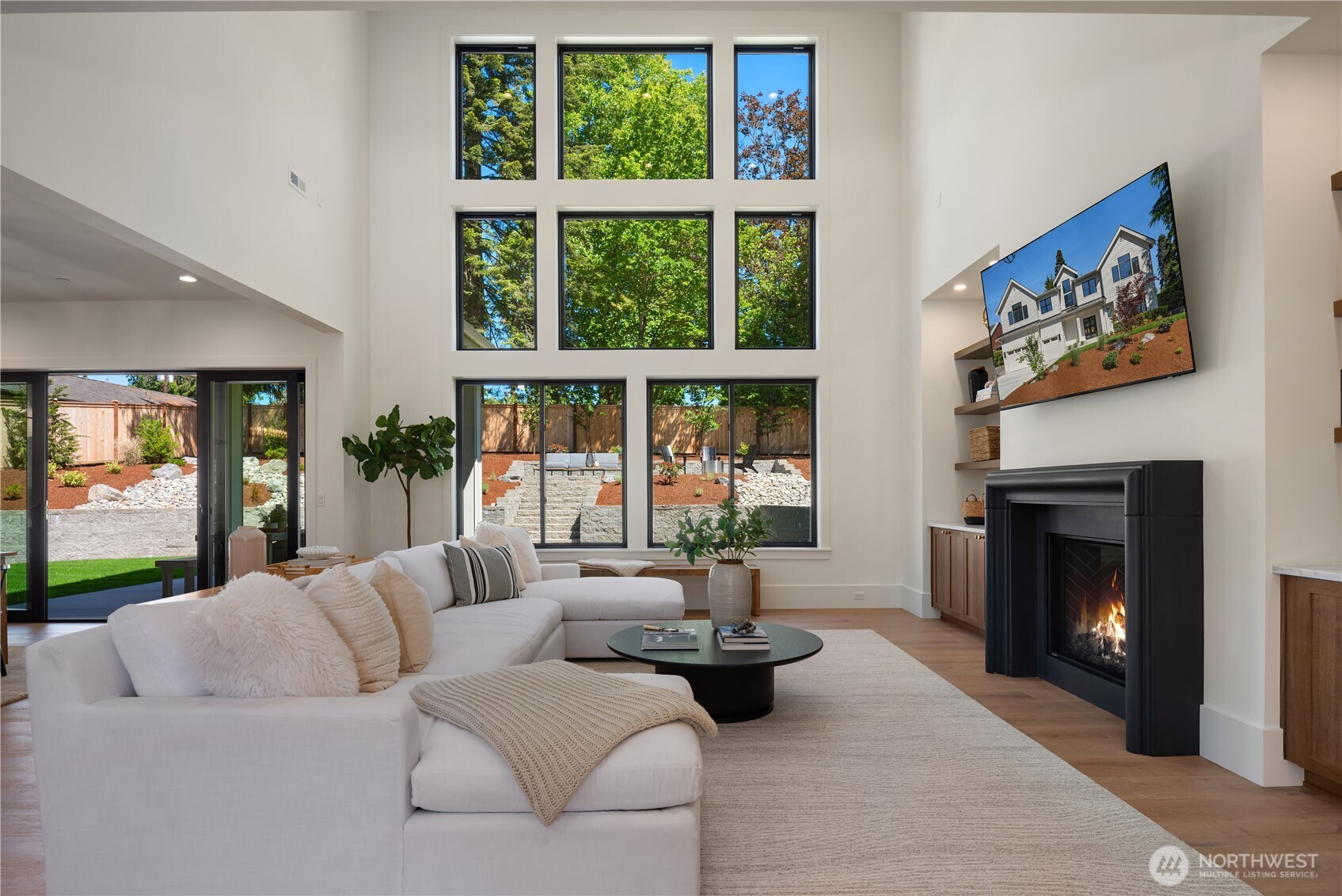 Soaring two-story windows stepping through the entry way