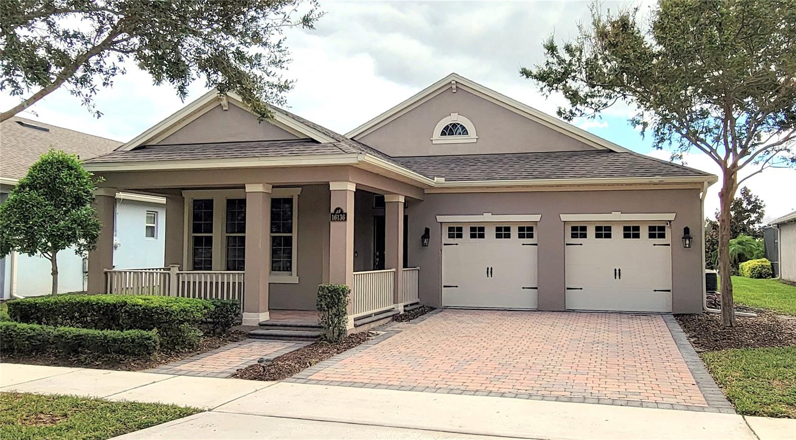 Beautiful Waterfront 4-3 home in Waterleigh with large green space in front of the home and INCREDIBLE pond and lake views in back. Thisdesirable Calder model is a 1 story home and offers 4 bedroom, 3 baths, plus a den/office with many upgrades and great views. The front drive and walkway are paved and lead up to a large porch with a peaceful view of a wide green space with mature trees. The home is detailed with tall ceilings and 8-foot, 6 panel decor doors throughout, recessed tray ceilings, elegant arches, and a tasteful light beige-colored walls throughout. Décor tile floor through the main home, and beautiful wood floor style plank tile in all bedrooms. The Designer kitchen has moco-colored, tiered, 42-inch cabinets with crown molding and under cabinet lights to accent the tumbled marbled backsplash, café` series kitchen stainless-steel appliances, and accented by gorgeous granite counters. It offers a glass top stove, French door fridge with bottom freezer, large walk-in pantry, and large sink island with breakfast bar, lite with pendant lights overlooking the family and dining area. The family room sliding door leads out to a covered and screened lanai with incredible serene water views. A second patio is outside for the cooler days to soak up the sun. The Primary Bedroom has water views, tray ceiling with fan and recessed lighting. The Primary bathroom has a walk-in shower with glass enclosure, a large 8x9 ft walk-in closet, separate linen closet, separate toilet room and dual sink vanity with extra storage. The floor plan splits the primary bedroom away from the secondary bedrooms for privacy. Two bedrooms share a jack and jill bath with dual sinks and separate toilet and tub room for more efficient use. The 4th bedroom shares a hall bath near the laundry. The laundry room provides a washer and dryer installed and many cabinets and granite counters for storage. The office/den/flex room also faces the back with the awesome water views. All bedrooms, living room, and den/office/flex room all have ceiling fans. Lawn care is included in the HOA fees. This amazing home is in the highly desirable community “Waterleigh.” Located just off the 429 west of Disney, This community amenities include 3 resort style pools, 2 fitness gyms, club houses, putt-putt golf, dog park, huge sports fields, playground, beach volleyball, Tennis, lake dock and view BBQ/picnic area, with walking paths and exercise stations that wind around the scenic lakes, nature, and community for a relaxing and enjoyable lifestyle. Fast and easy access anywhere. Hospitals, restaurants and shopping are all close and many more are being built nearby. Great schools; Water Spring Elementary, Water Spring Middle, and Horizon Highschool. All information here is deemed reliable but not guaranteed. Please email for more information or to get started in making this incredible home, YOUR home.