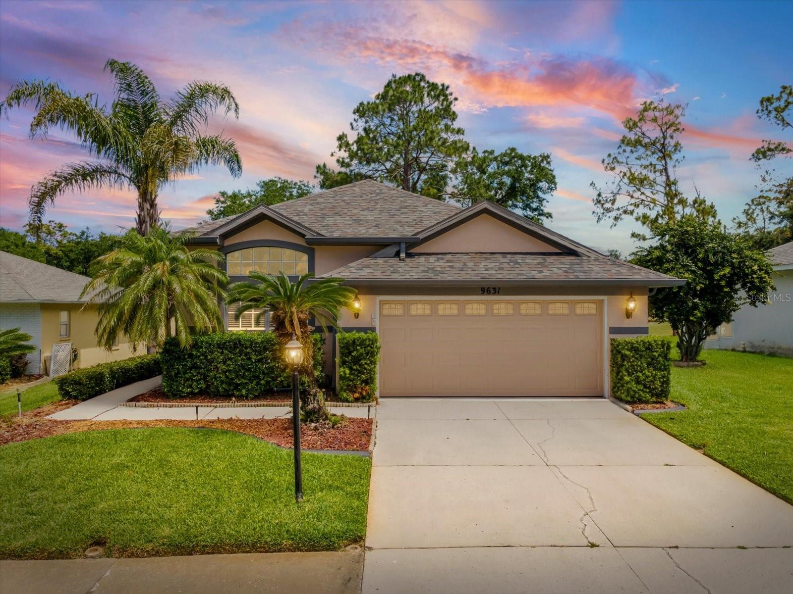 WOW!!! Have a look-see! Located at Hole 7, here's your 3 bedroom POOL home in the golf community of Timber Greens. No renovations left to do! LIGHT and BRIGHT, high ceilings, open floor plan with new kitchen and bathrooms all tastefully remodeled with timeless finishes. Large 12x14 front bonus room with french doors could be used as a den, office, man-town, craft room, dining room or formal living room. The open kitchen features premium all wood cabinetry, carrara marble countertops and professional gas range with electric oven. The Florida room features clear vinyl sliding panels (removable) offering protection from wind, rain, and cold in the winter months while remaining easily detachable for warmer weather. The roll-up sun shades offer additional privacy and shade when desired. Multiple patio areas inside and outside the lanai allow plenty of space for outdoor dining, lounging, a firepit, etc. The pool area features an outdoor shower with landscaping for privacy and no rear neighbors. You are storm ready with the newly replaced, 2025 whole home 18kW air cooled propane gas generator. Visit www.timbergreens.net to see all the available activities and amenities of this very active adult community. Cable, internet and trash service are all included in the low monthly HOA fee. All the big ticket items are DONE: New roof 2019, hot water heater 2020, overhead garage door and opener 2020, all new gutters 2022, new high-efficiency Carrier SEER2 HVAC system 2022, new 2 speed pool pump 2024.