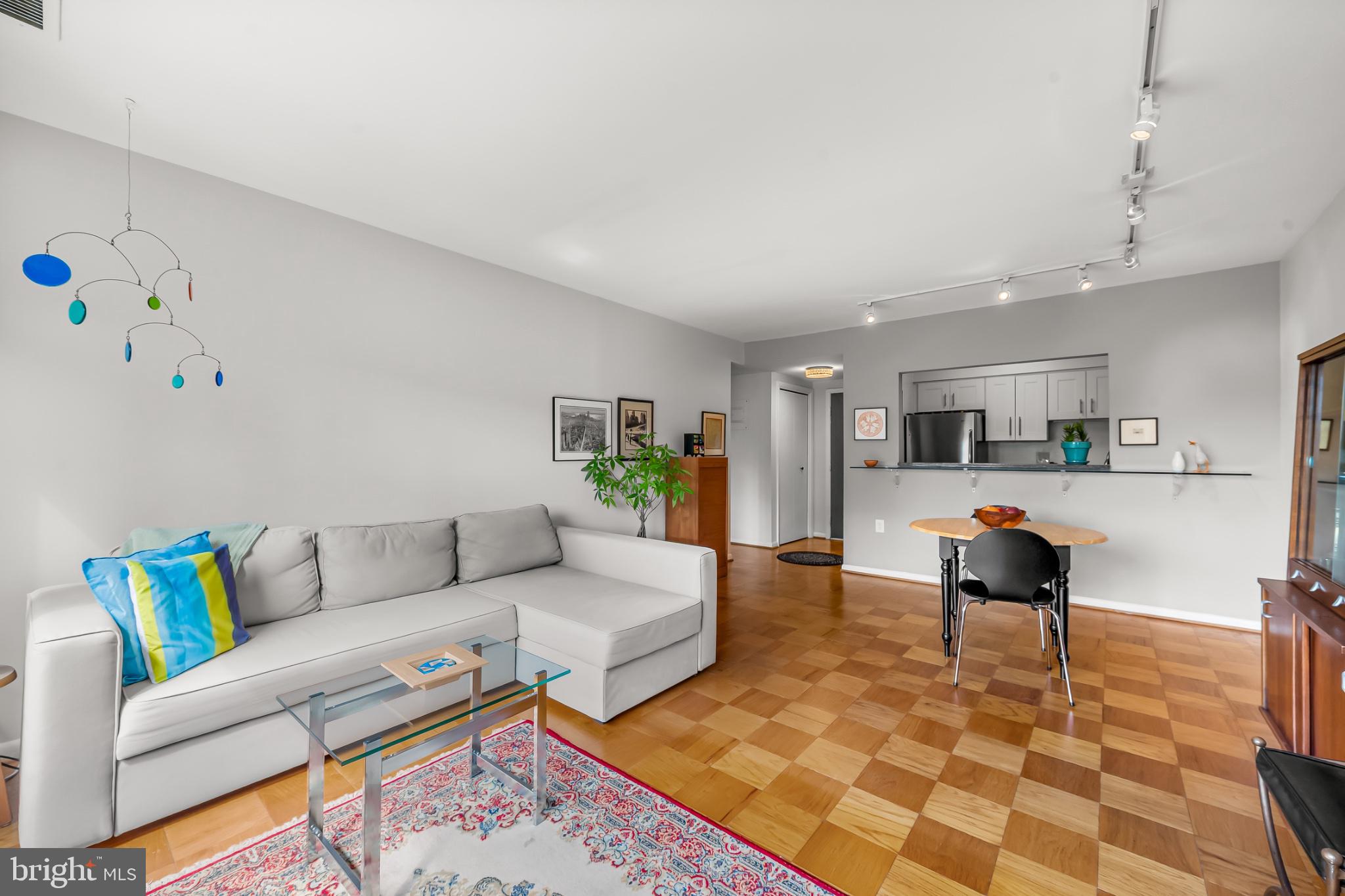 --Welcome to this sunny, move-in-ready one-bedroom, one-bath condominium at 1 Hamill Court, a desirable elevator building ideally located in the Village of Cross Keys. 1 Hamill Court combines comfortable one-level living with added convenience and security.Renovated and filled with natural light, the condo features a fresh, neutral palette and an easy, open flow between the living and dining areas and the thoughtfully designed kitchen with granite countertops. The generously sized bedroom is bright and airy with abundant windows and a large walk-in closet. Other closets throughout provide generous amounts of storage as well as an additional storage locker which conveys with this property.One of the advantages of 1 Hamill Court is the ease of everyday living.This mid-rise building offers elevator access and an additional layer of security with a controlled buzzer entrance, in addition to the community’s gated front entrance. A conveniently located trash and recycling room is right down the hall, eliminating the need to carry trash outside. A dedicated parking space and plenty of additional parking for guests. The condo fee includes electric, gas, water  and building services, along with access to three community swimming pools and tennis and pickleball courts. Beautiful walking paths throughout Cross Keys make it easy to enjoy the landscaped surroundings and the walkable lifestyle that makes this community so appealing.And the location is hard to beat. Just steps from your front door is the large swimming pool with lap lanes and mature landscaping, as well as the Village of Cross Keys exciting mix of restaurants, cafés, boutiques, professional and wellness services, and a seasonal farmers market. Another special feature for community members is the architecturally pleasing  clubhouse for personal and community events including art classes, yoga and mahjong. Nearby Roland Park and Mount Washington offer even more shopping, dining, and everyday conveniences.With easy access to I-83 and I-695, getting around Baltimore and beyond is a breeze. Move right in and enjoy the security, elevator access, amenities, and effortless lifestyle that make 1 Hamill Court a uniquely convenient place to call home within the Village of Cross Keys.