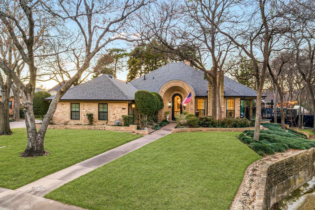 Creekside Calm. Designer Precision. Enduring Luxury. Where wellness, craftsmanship, and quiet luxury converge. Set behind mature hedges on a gated, creekside 0.54-acre lot, this designer- owned residence offers privacy, architectural integrity, and refined living just 15 minutes from downtown Dallas. Thoughtfully reimagined over time, the four- bedroom, three-bath home spans 2,844 square feet and includes a detached 224-square-foot studio with infrared sauna, ideal for wellness, office, or creative retreat. Interiors feature white oak floors, custom drapery, vintage Murano glass lighting, and designer fixtures by Kelly Wearstler and Visual Comfort. The chef’s kitchen is appointed with Miele appliances, Calacatta marble, and ten- foot ceilings. Marble-clad baths and a serene primary suite include heated floors, a Victoria + Albert soaking tub, Thasos marble, and Toto bidet.Extensive upgrades include dual HVAC systems (2022), updated electrical (2017–2024), Pella windows, new roof and gutters (2022), tankless water heater, custom-designed steel front door (2021), and whole-home generator (2023). Outdoor living features a renovated pool with limestone decking, rainwater harvesting supporting greenhouse and garden beds, and a finished patio with ambient lighting. The scope of infrastructure investment and design execution represented here would require substantially greater time, disruption, and cost to recreate today. This offering presents a rare opportunity to acquire a fully realized home— where the vision is complete and the value lies in what you don’t have to build.