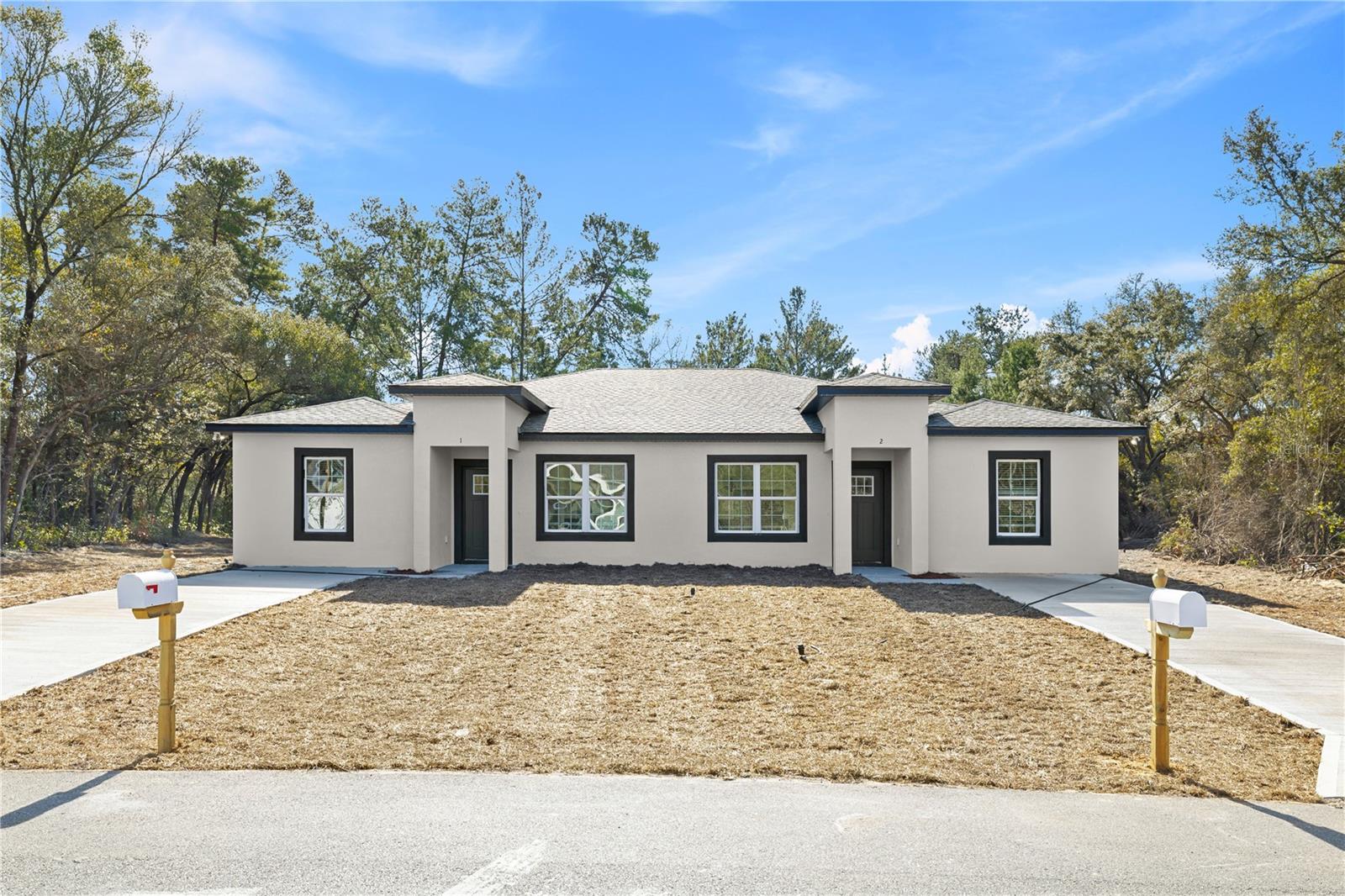 New Construction Duplex 2026-Prime Investment Opportunity. This brand-new duplex offers an exceptional opportunity for investors and owner-occupants seeking strong cash flow, future expansion, and long-term appreciation in Central Florida. This property provides a rare chance to expand your portfolio or significantly increase rental income potential a true value-add investment. Each unit features 3 spacious bedrooms, 2 full bathrooms, and 1,320 sq. ft. of thoughtfully designed open-concept living space. Modern finishes include luxury vinyl plank flooring throughout, a contemporary kitchen with stainless steel appliances (refrigerator, range, microwave, and dishwasher).The property also includes a 2-10 Home Buyers Warranty, offering added peace of mind and protection on major systems and structural components. With no HOA and no CDD fees, owners benefit from lower operating costs and greater flexibility. Located in a quiet residential area of Ocala, the property is conveniently close to schools, shopping, and major roadways, making it highly attractive to tenants and residents alike. Small pets are welcome, further enhancing rental appeal. This is an ideal opportunity for those looking to live in one unit and rent the other, or for investors seeking steady cash flow, scalability, and a solid long-term investment in one of Central Florida’s growing markets.
