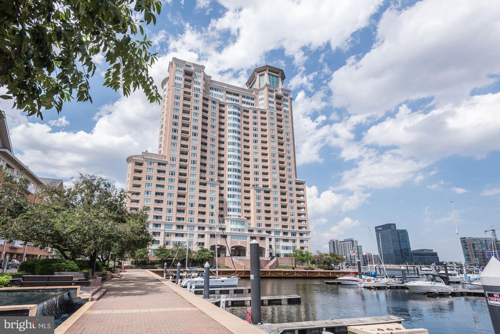 Unit 1708 - a sophisticated 17th floor condominium features approximately 1,138 square feet of living space enhanced by spectacular views of the Baltimore Harbor. This home offers an open floor plan with a spacious living/dining room combo, a private one bedroom ensuite, and a separate powder room. The primary bedroom is spacious and well-appointed with extensive, mirrored built-ins for added storage and convenience. Two gated garage parking spaces convey.The living/dining room combo affords great entertaining and daily living with beautiful custom built-ins and easy access to the private outdoor deck. A sun-drenched unit boasts large windows throughout the home that highlight spectacular views of the Domino Sugars sign, the cruise ship terminal, the outer harbor and thebuild site for the Key Bridge.Building amenities offer a gym with ellipticals, treadmills and free weights, an indoor pool, outdoor pool, party rooms with billiards and a cozy fireplace, as well as a 24/7 front desk - adding to the luxurious lifestyle the residents enjoy.Close proximity to major arteries - I-95, I-83, and to BWI Airport and AMTRAK stations makes for easy commuting.  And The Harborview Towers - located on the Inner Harbor Promenade - afford access to restaurants, shopping, and events as well as Ravens Stadium and Oriole Park.
