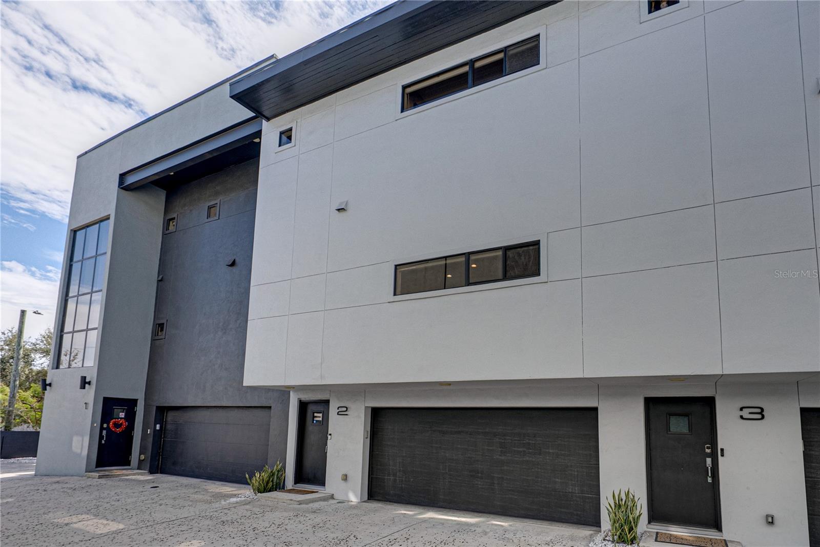 Welcome Home! Stunning in South Tampa 2BD/2.5BA luxury townhome is perfectly located in Palma Ceia. Centrally located near restaurants, boutiques and my favorite, the walkability to Bay To Bay Blvd is one of the standout features of the area! New membrane roof 2025! As you make your way to the very open-concept living room, dining room and kitchen you will notice how the openness creates a sublte elegance, airy space along with a social connection. Whether you are cooking, reading on the sofa or entertaining friends and family around the dining room table there is a strong sense togetherness with an easy flow of interaction. The kitchen perfect for hosting has generous amount of cabinetry as well as the oversized pantry providing exceptional storage, keeping everything organized. Upgrades in the kitchen include the new refrigerator in 2025, dishwasher in 2024.   Ascending to the third floor you will discover the primary suite and second bedroom.  The primary bedroom serves as a serene escape at the end of a long day with ample amount of closet space. The remodeled en-suite has been thoughtfully updated to create a spa inspired as well as modern style with elevated finishes for that cohesive, designer look.  The second bedroom offers comfort with its own private bath enhancing convenience and privacy. Making your way out back you will find the new patio deck that was done at the end of 2025.  You will start to envision those weekend get togethers, morning coffee or evenings relaxing in the comfort of your very own outdoor oasis.  The interior was painted in Dec 2025 and hot water heater replaced in 2024.  This home is a must see contact me today to schedule your very own viewing.