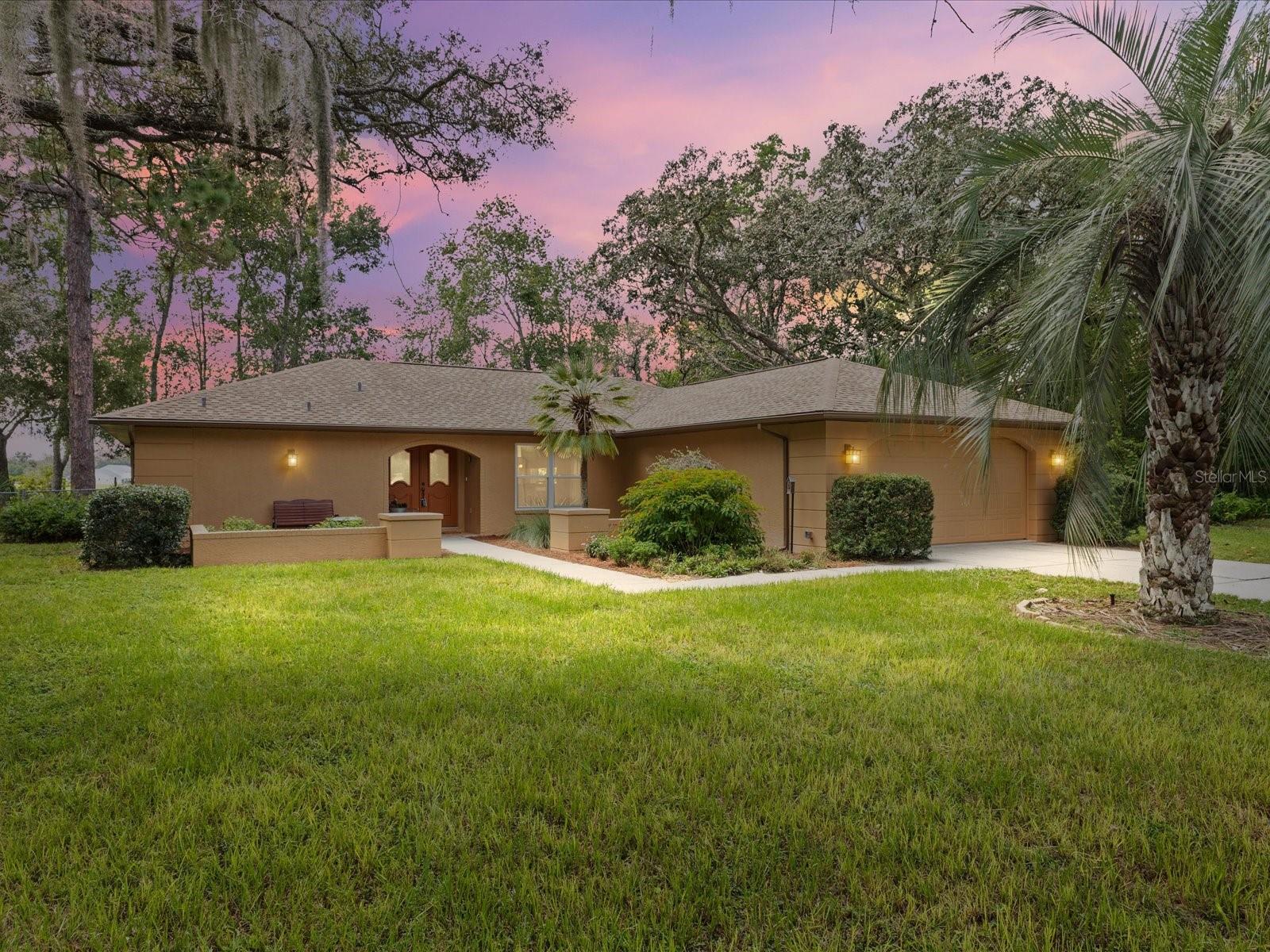 Welcome to this Artistic Built Home Nestled on a Beautiful Eco Friendly Landscaped Half Acre Lot w/No Build Behind. Located in a Highly Desirable Area of Spring Hill this Home Features an Open Concept 3 Bedroom Split Plan, 2 Baths & 2 Car Garage - Meticulously Maintained by the Second Owner! Updates include: A/C, Windows, Patio Glass Doors & Interior Paint 2025. Septic Drainfield & Exterior Paint 2024. Kitchen 2013 w/Appliances less than 4 yrs. 2012 Roof Cleaned & Coated 2024. Fenced Rear Yard w/Water Pond (New Electric 2025). Sprinkler System is on a Well. Conveniently Located near Recreational Parks, Shopping, Schools, Medical Facilities, Dining & the Suncoast Parkway for Easy Commuting to Tampa/St Pete Areas. Discover Florida's Nature Coast - The Gulf of Mexico, Waterfront Dining, Weeki Wachee State Park - Home of the Mermaids, Fishing, Boating, Beaches, Hiking & More! Call today for your Private Viewing.