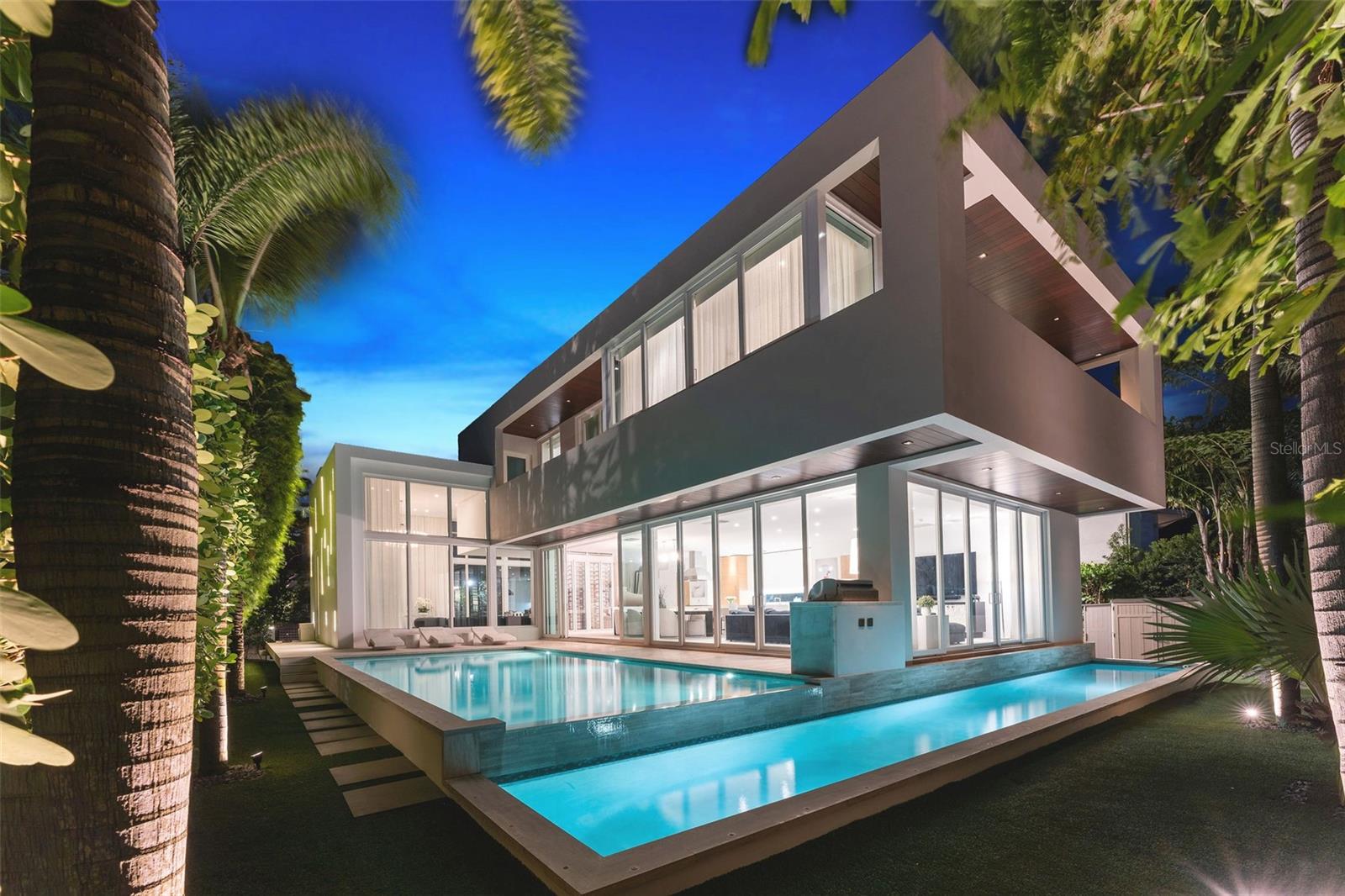 Welcome to 4433 N Bay Rd, a fully renovated, mint-condition modern masterpiece by world-renowned architect DOMO, on Miami Beach’s iconic “Billionaire Row.” This turnkey 3,534-sq-ft residence on an elevated site provides added safety among storied legacy homes. Soaring ceilings, Venetian plaster finishes, and a climate-controlled glass wine cellar define the refined interiors. The chef’s kitchen features Sub-Zero and Viking appliances. Outdoors, a heated saltwater pool, professional-grade BBQ, private terraces, and elegant entertaining spaces complete this rare, world-class residence. A true collective cultural artifact.