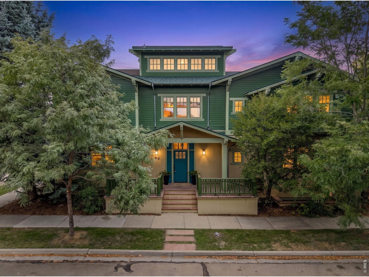 Set on a private lot in the heart of Prospect New Town, this custom home designed by architect James McCutcheon-captures a beautiful balance of elevated design and everyday living, all within one of Longmont's most vibrant, connected communities. Just outside your door: beloved eateries, local shops, parks, and that unmistakable neighborhood energy where people gather, connect, and truly know each other.Inside, the home is grounded in quality and intention, with spaces that feel both refined and welcoming. The chef's kitchen is a standout, anchored by an iconic AGA cast-iron range with four ovens, an Advantium oven, and a generous eat-in area that naturally becomes the heart of the home. The main floor offers a private bedroom suite, while the primary retreat invites you to unwind with a steam shower, soaker tub, and a quiet sense of luxury.Thoughtfully designed for both connection and retreat, the home features a finished lower level with a theater room, wine cellar, and exercise space, along with a top-floor office that captures mountain views-an inspiring place to work, create, or simply take it all in. A 3-story Inclinator elevator adds ease and accessibility throughout.Outdoor living here is just as special, with a covered patio and fireplace, expansive decks, a tranquil koi pond, and beautifully landscaped grounds that create a private oasis within this social, lively neighborhood.The 800+ square foot carriage house offers incredible flexibility-perfect for guests, extended living, a studio, or rental opportunity. With features like whole-home sound, Low-E windows, multiple mechanical systems, this is a home built with care, intention, and lasting quality.A truly special offering-where thoughtful design meets community, and home extends well beyond the front door.