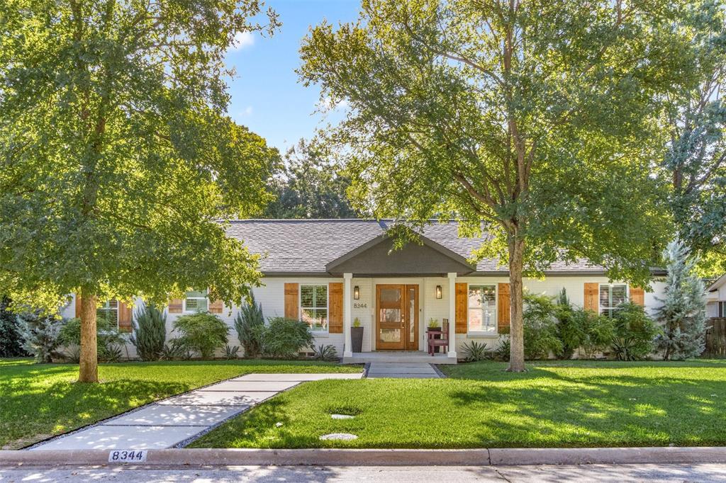 Enjoy walkable access to the Dallas Arboretum, White Rock Lake, and Smoky Rose, all while living in the heart of beautiful Forest Hills. This thoughtfully updated home offers three bedrooms plus a dedicated office.Light wood floors, an impressive 10-foot island, floating shelving, white quartz surfaces, and curated designer fixtures create a clean, elevated aesthetic throughout. There is abundant storage with plenty of built-ins.The primary suite features a generously sized bath and closet. Situated on a quarter-acre lot, the home is framed by lush landscaping and a spectacular backyard ideal for entertaining or relaxing.