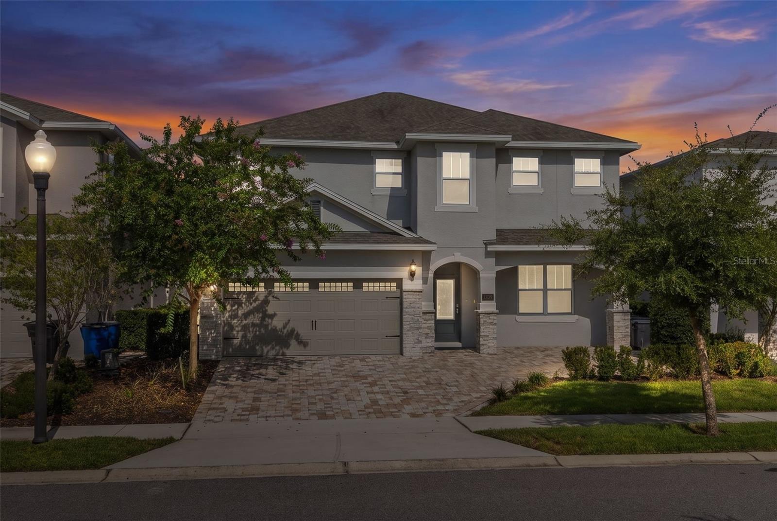Welcome to your Florida retreat! Located inside of Reunion West luxury community, right across from the waterpark, Encore Club, and tennis courts. The Encore Resort is a gated community offering a waterpark, a resort-style pool, restaurants, a kid's playroom, tennis courts, basketball courts, sand volleyball courts, a soccer field, fitness center, mini market and 24 hr. concierge service! A shuttle bus service is also available with transportation to nearby Walt Disney Resort, Disney Springs, Universal Studios, and shopping malls!  This spacious 5-bedroom, 5.5 bath home offers nearly 3,000 square feet of beautifully designed living space with plenty of room to gather, relax, and entertain. Step inside to a bright, open layout that flows effortlessly into the kitchen and main living areas, then head outdoors to enjoy your own private pool, spa and covered patio-perfect for soaking up the Florida sunshine or unwinding after a day of fun.  Generously sized bedrooms and abundant bathroom space make the home especially well-suited for hosting family and guests.  With attractive curb appeal, a paver driveway, attached garage, and a location in the heart of the Kissimmee area, this home offers the space, and lifestyle buyers are looking for. Whether you're searching for a primary residence, Florida getaway, or investment opportunity, this one deserves a closer look. HOA includes landscaping maintenance, irrigation, pest control, pool care (optional), trash collection, cable TV, and high-speed internet!  Schedule your private showing today!