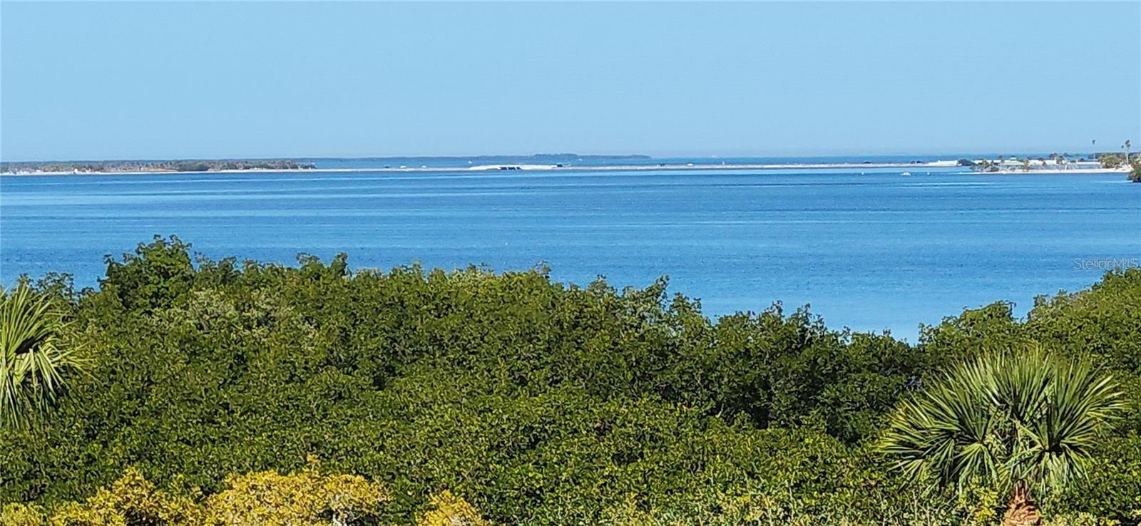 Won’t last. Much sought after Gulf view condo.  Looking for a winter getaway, renter investment or permanent residence in an upper floor end unit with wrap around views, close to elevator with garage assigned parking, steps from private marina for Gulf access (within minutes-not hours) for kayaks to 40 ft vessels, furnished (or not) 2bed/2bath with additional murphy bed that provides sleeping for up to six?  All this in a resort-like community with 24/7 attended gate access and many, many amenities at a price that allows for upgrading to your liking but already has recent installed gold standard, Miami-rated impact glass windows (5) and glass slider doors (2) a 45k upgrade. See all the photos of exterior views and interior layout or enjoy the fully narrated HD video to find out how this private paradise property could be yours and make a personal or virtual appointment to get it.