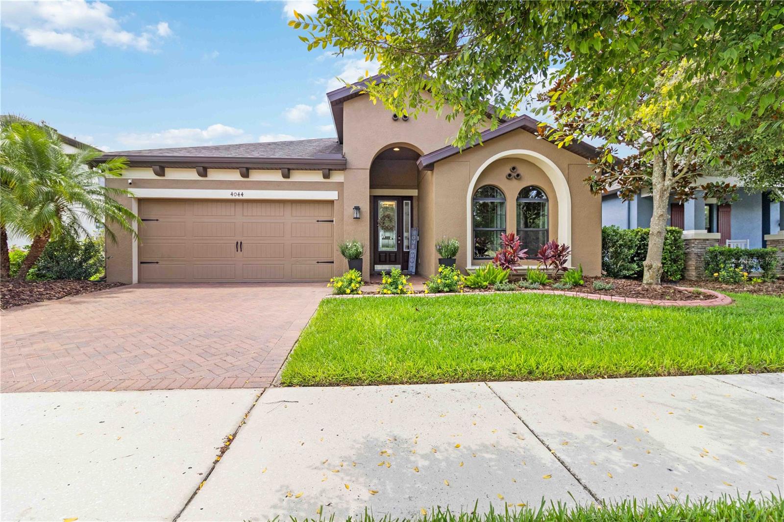 Welcome to this beautifully maintained, single-owner home built in 2017, offering 3 bedrooms, 2 full bathrooms, a large Den/office and an open-concept layout designed for both comfort and style. From the moment you step inside, you'll notice thoughtful upgrades throughout, including a modern tile backsplash in the kitchen, stylish accent walls, and elegant finishes that set this home apart. The open floor plan flows effortlessly from the spacious living area to the dining and kitchen spaces, making it perfect for entertaining or relaxing with family.

The kitchen features sleek cabinetry, stainless steel appliances, and ample counter space for meal prep or casual dining. The owner's suite offers a tranquil retreat with generous space, a walk-in closet, and an en-suite bathroom. Two additional bedrooms provide flexibility for a home office or guest space. Every inch of this home has been lovingly cared for and is truly move-in ready.

Whole House Softener 2/25, Solar Panels 2018 (under Warranty and electric bill is nominal), Roof 2017, Water Heater 3/25, Smart Washer and Dryer 2025, Arlo and Ring Cameras, Smart AC 2017, Garage is fully insiulated and has an air duct, Under Cabinet Lighting and the landscaping has been meticulously maintained and offers beautiful serenity. 

Step outside to your private backyard oasis, which backs up to a peaceful pond—ideal for enjoying quiet mornings or watching Florida sunsets. Located in the desirable Land O' Lakes community,, TOP RATED Montessori school is across the lake, Advent Center Ice is 15 minutes away, Amalie arena, Raymond James Stadium and loads of shopping opportunities are all minutes away. Conveniently located near the veterans expressway so you can be to Tampa Airport in 25 minutes!!! You'll enjoy convenient access to top-rated schools, shopping, dining, and major highways. This home also has a Universal Design concept and many Handicap features includimg ramps. Don’t miss the opportunity to make this upgraded, well-kept home yours—schedule your private showing today!