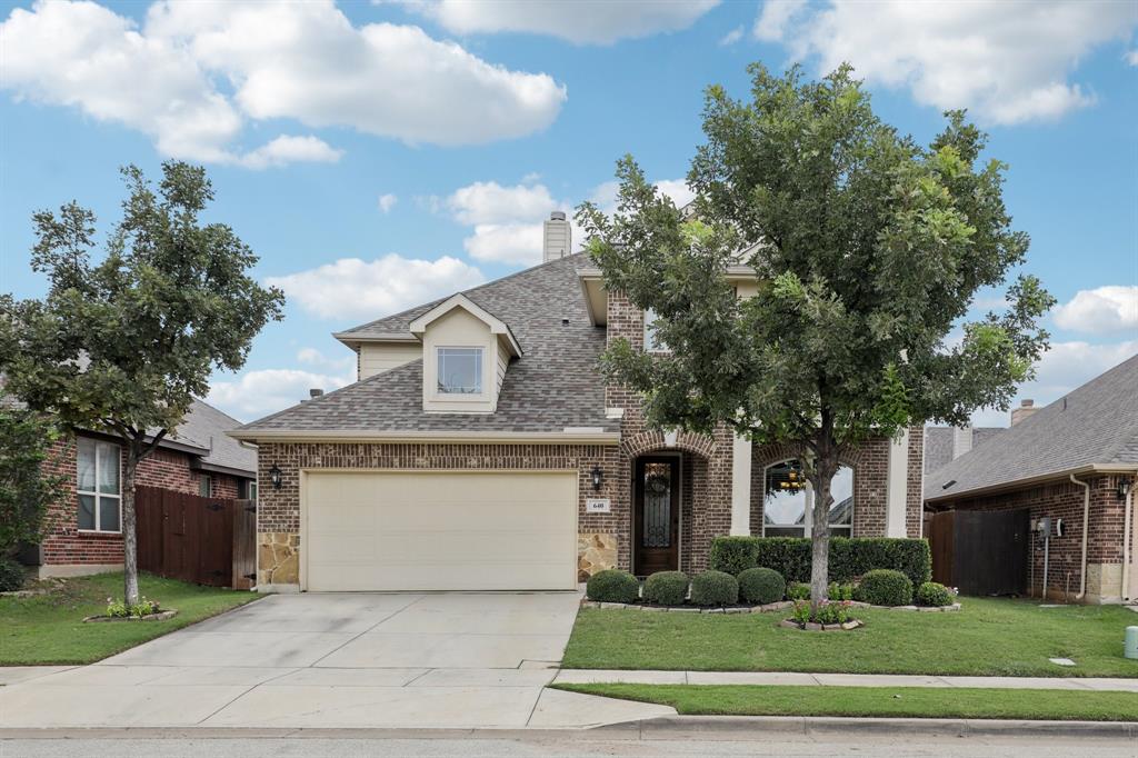 Welcome to 640 Tierra Vista Way in Fort Worth, TX! This exquisite 5-bedroom, 3.5-bathroom home perfectly balances elegance, comfort, and modern upgrades. From the moment you walk in, you’ll be greeted by the charm of hand-scraped wood floors and the cozy ambiance of a large stone fireplace that serves as the centerpiece of the living room.  The heart of this home is the spacious kitchen, thoughtfully designed with a large walk-in pantry, abundant cabinetry, and a layout that’s perfect for both cooking and entertaining. The open-concept design seamlessly connects the kitchen to the dining and living areas, creating an ideal space for gatherings of any size.  The primary suite offers a serene retreat, while the additional bedrooms provide ample space for family, guests, or even a home office. Each bedroom features a generous sized closet, including one upstairs that’s large enough to serve as a second primary suite. Fresh paint throughout gives the home a bright, move-in-ready feel, while major updates like a new roof (installed in 2021) provide added peace of mind.  Step outside to a private backyard, perfect for relaxing evenings or lively barbecues. The community amenities are equally impressive, featuring two pools, a baseball field, and a soccer field. Plus, this home is located in the highly sought-after Northwest ISD! This home offers a 2.5% assumable VA loan! Call the listing agent for more details.  Situated in a desirable neighborhood close to shopping, dining, and top-rated schools, this home offers both convenience and timeless style. Don’t miss your chance to make this your forever home!