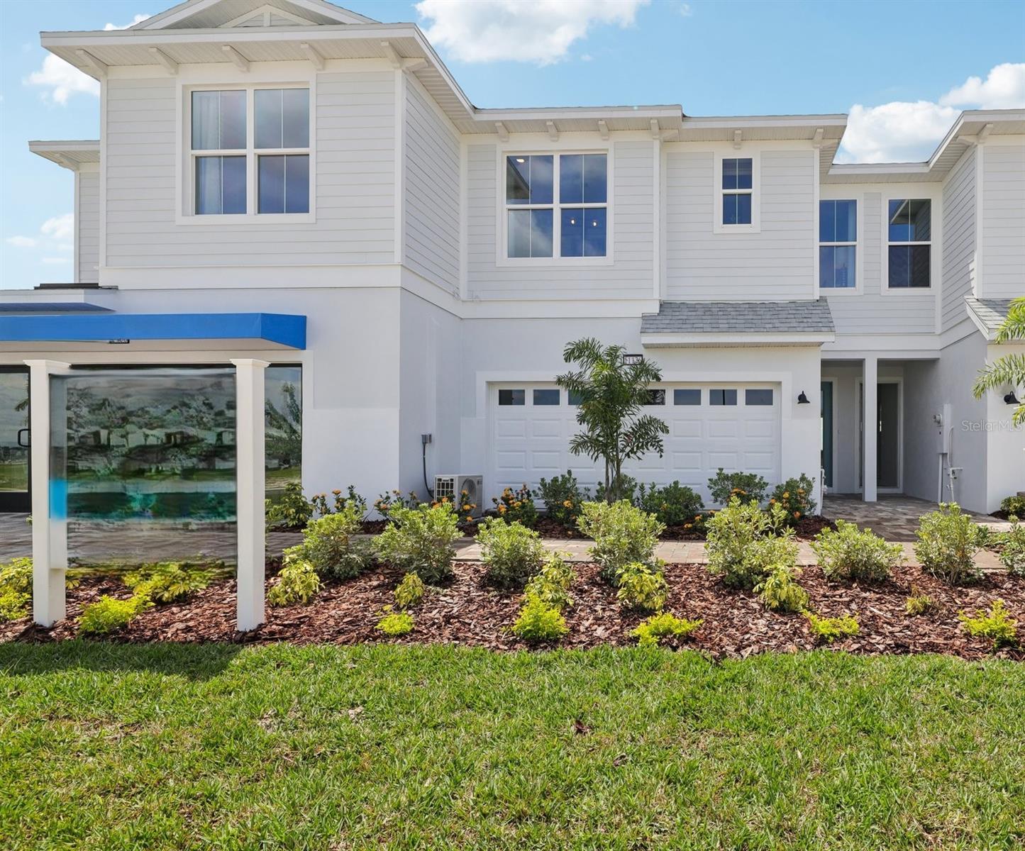 Discover low-maintenance living, modern design, and a prime location in this popular Aruba model townhome in the gated community of Isla Mirada, part of the sought-after Mirada master-planned development. This thoughtfully designed 3-bedroom, 2.5-bath townhome features an open-concept floor plan with soaring ceilings, abundant natural light, and stylish finishes throughout. The modern kitchen offers quartz countertops and a tile backsplash, creating a bright and inviting space for everyday living and entertaining. The spacious primary suite is located upstairs and features a generous walk-in closet and en-suite bath with dual-sink vanity. Two additional bedrooms provide flexibility for guests, a home office, or additional living space. A private lanai offers a peaceful outdoor retreat with serene wetland or lagoon views. Additional features include a 2-car garage, convenient storage, and the low-maintenance lifestyle of townhome living. Residents of Isla Mirada enjoy a gated setting with sidewalks, trails, green spaces, and easy access to the amenities of Mirada, including the expansive Mirada Lagoon, parks, walking trails, and outdoor recreation. Conveniently located near dining, shopping, and major highways.