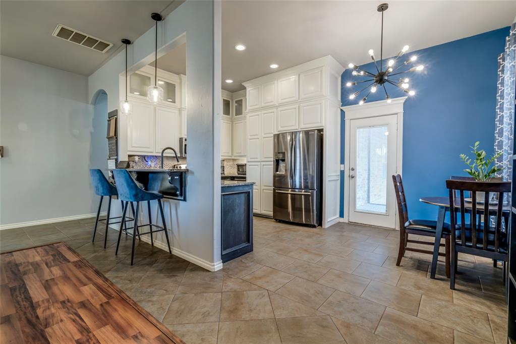 Welcome to the good life in the highly desired Ironstone community, offering top-rated Edmond schools and exceptional convenience. Major updates include a new roof (2022), full guttering (2023), new water heater (2023), water softener and reverse osmosis system (2023)—providing cleaner water and protecting plumbing and appliances—plus a new dishwasher (2024), newer wood laminate flooring (no carpet anywhere!), and ceiling fans throughout. This 3-bedroom, 2-bath home features a bright, open floorplan with a refreshed kitchen showcasing freshly painted cabinetry, granite countertops, and stainless-steel appliances. The spacious living and dining areas flow easily for both everyday living and entertaining. The private primary suite offers a generous layout with a cozy sitting area and direct access to the patio. The en-suite bathroom includes double vanities, abundant storage, granite countertops, a jetted soaking tub, a walk-in shower. Two additional bedrooms provide flexibility for guests, a home office, or hobbies. Step outside to your screened-in patio, creating the perfect indoor-outdoor vibes. Enjoy morning coffee bug-free, unwind after a long day, or relax while everyone splashes in the above-ground pool (installed 2022). Just steps from the neighborhood park, multi-use sport court, and walking trails, this home blends comfort with an active lifestyle. Ideally located near Hwy 74 and the Kilpatrick Turnpike, with exciting new shopping and dining developments on the horizon. If you’ve been searching for a home with thoughtful upgrades, lifestyle perks, and a truly convenient location… this is it.