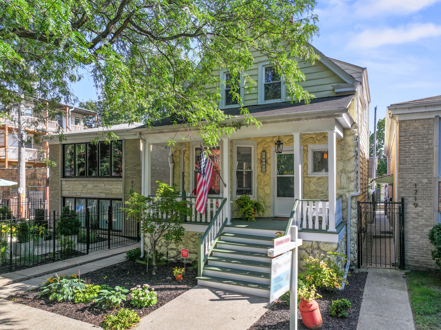 Welcome to 1717 W Catalpa Ave - a 1906 Andersonville gem that seamlessly blends timeless charm with modern updates. This 3-bedroom, 3.5-bath home has been thoughtfully renovated throughout, offering great living space and storage while preserving its vintage character. The recently gut-rehabbed first floor and basement feature a stylish kitchen with updated appliances,  refreshed baths, and flexible living areas. Upstairs, the fully-renovated second floor boasts a serene primary suite with a spacious walk-in closet and ensuite bath, plus two additional bedrooms and a full bath. The partially-finished basement adds even more versatility with a family/bonus room and full bath - perfect for guests, a home office, or recreation. Outdoor spaces are just as inviting, from the classic covered front porch to the expansive backyard deck, ideal  for relaxing or entertaining. A two-car garage provides added convenience. All of this sits just steps from Andersonville's vibrant dining, shopping, and cultural scene, making this home the perfect balance of historic character and modern comfort in one of Chicago's most sought-after neighborhoods.