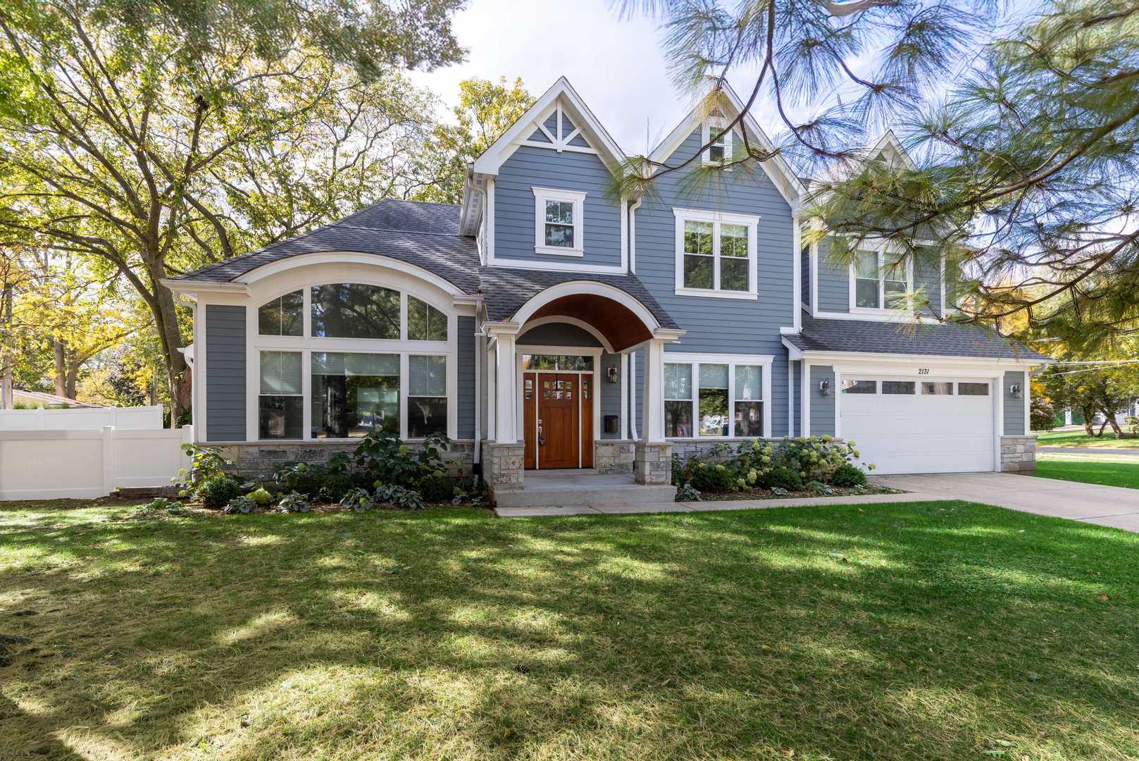 The home you've been waiting for! Gorgeous 2017 construction in the McKenzie School District with an open floor plan and high-end finishes throughout. Luxury, comfort, and elegance abound in this 6-bedroom, 5 1/2 bath, 6,200-square-foot home, ideally situated on a quiet cul-de-sac street with an attached garage. At the heart of the home lies the family room, where a fireplace sets the stage for cozy evenings under a magnificent 17-foot cathedral ceiling. The kitchen is a chef's dream, equipped with Thermador appliances, white custom cabinetry, quartz countertops, and a generous island. The library and dining room provide the perfect retreats for family gatherings or entertaining friends. The first floor includes a bedroom with an ensuite bathroom, while the second level features four additional bedrooms-including a stunning primary suite with a soaring 14-foot ceiling and a spa-like bath that promises tranquility. A second-floor laundry room adds convenience for everyday living. Other highlights include a first-floor mudroom with storage lockers and a pet shower, a finished lower level with a wet bar, customized play area, additional bedroom, and full bath, plus a finished attic perfect for a home office or playroom. Don't miss the chance to make this exceptional home in the award-winning New Trier School District your own.