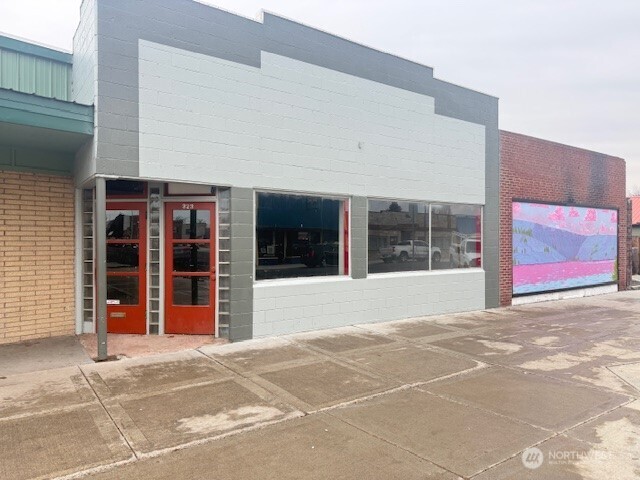 3,575 square foot building on 3600 square foot lot. Interior has been stripped down to concrete block walls and trusses. Ready to be redone in your vision.  New 60MIL TPO Membrane Roof installed July 2024.