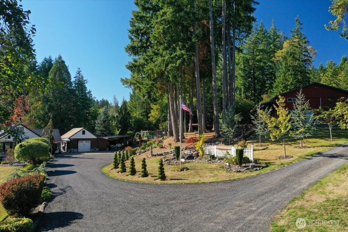 Discover this spacious 3 bd, 1 & 3/4 bath home offering 1,840 sq. ft. of comfortable living space on a peaceful 1.8-acre setting. Step inside to find a welcoming floor plan featuring a bright dining room, large master suite, and a versatile office—perfect for remote work or hobbies. Outside, you’ll love the fantastic landscaping, mature trees, and open space for entertaining or relaxing. But that’s not all this property includes a permitted 960 sq. ft. apartment attached to the shop, complete with 1 bedroom, full kitchen, and bath, ideal for guests, extended living, or rental income. Above the apartment, enjoy a massive game room ready for movie nights, recreation, or additional living space as well as plenty of shop space.