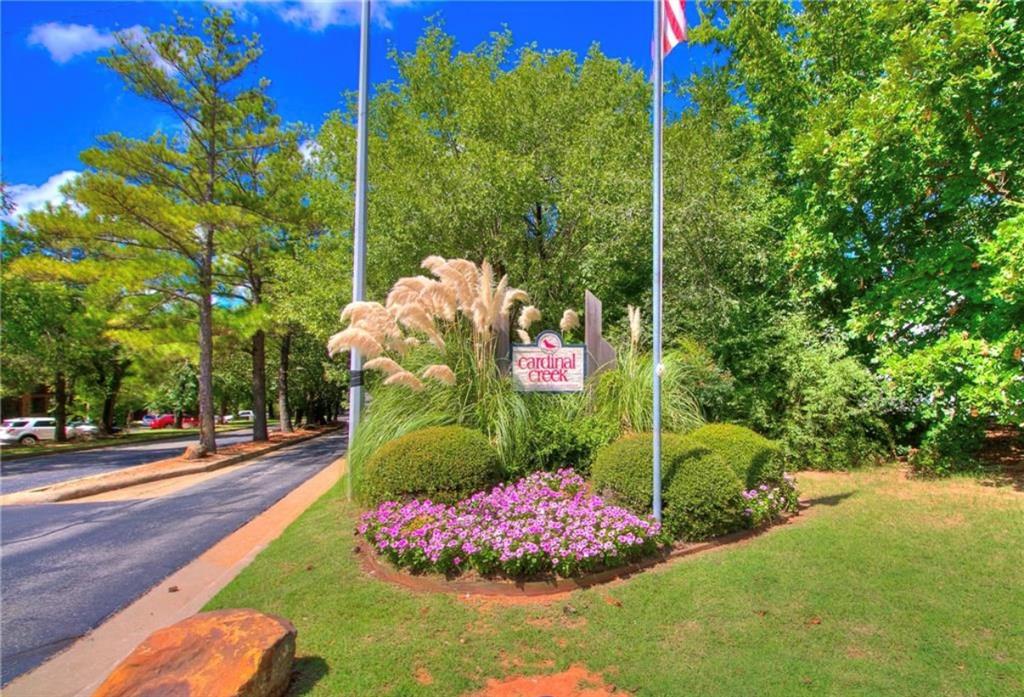 Secluded One Level Downstairs 2-bedroom 2-bathroom condo in a gated community adjacent to a prestigious golf course. Community amenities include a pool and fully equipped fitness center. This spacious townhome offers two large bedrooms and two full bathrooms, washer/dryer combo, refrigerator, along with a nice dining area and a spacious living area. The primary suite features a private bath and an oversized walk-in closet. A fenced backyard with a patio and the gate opens to a lush greenbelt. The community is close to the OU campus and right next to the Jimmie Austin OU Golf Club, providing a peaceful outdoor setting. Monthly HOA dues also include water, trash service, gated entry, pool access, and exterior maintenance.—Delivering low-maintenance living in a prime Norman location. Located just off of Highway 9 with easy access to restaurants, shopping, hospitals, healthcare,  and major highways.