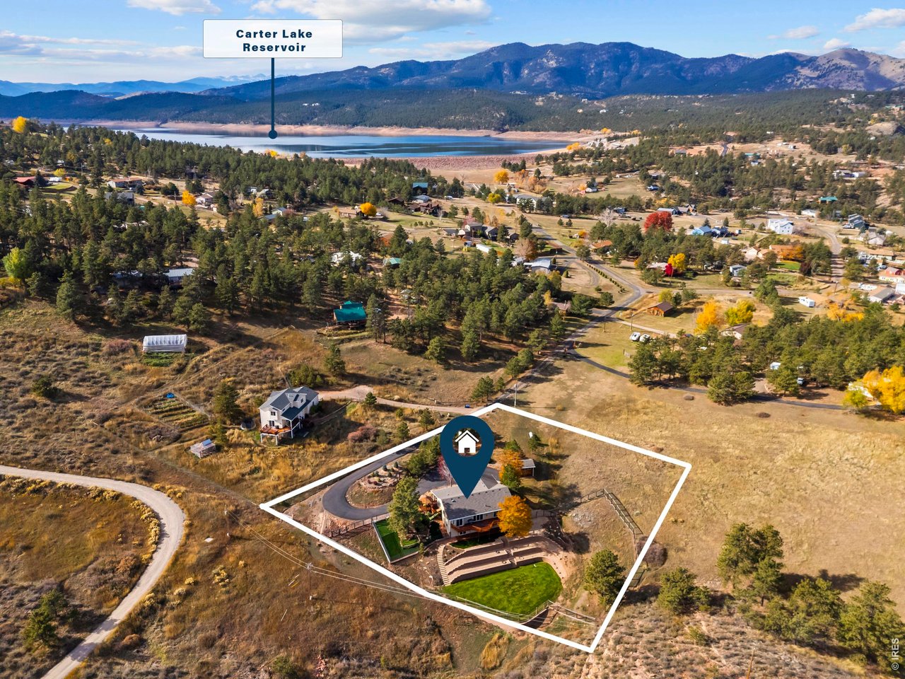 Wake up to breathtaking sunrises and watch multiple fireworks shows light up the valley from your back deck - this 3-bed, 3-bath ranch-style home on 1.3 acres delivers the Colorado lifestyle you've been looking for. Enter through your private gate and settle into a property that has been thoughtfully updated and meticulously maintained.Inside, enjoy brand new LVP flooring and recessed lighting throughout (2024), new stainless steel kitchen appliances, as well as Anderson windows, sliders and doors allow for welcoming views from every angle. Garage doors were replaced 4 years ago and myQ motor is new. Stay comfortable year-round with mini splits added in 2015 and freshly serviced in 2025. The Class 4 hail-resistant roof with transferable warranty was completed in 2025, giving your buyer serious peace of mind. The walkout basement includes a rec room, two additional bedrooms, a newly remodeled, three-piece bath, and plenty of storage space. Outside, the property truly shines. A beautiful three-tiered retaining wall, added in 2020, has been wired for electricity and has a drip system. This home also features a gazebo, a dog run with artificial turf, and a shed with additional storage space. The 4-inch Asphalt driveway was completed in 2023 and gives the property a clean, polished look and added confidence. This property also allows horses. North Carter Lake District water. The septic system has been cleaned and inspected (April 2026) and a transfer of ownership document was completed (May 2026). There is a voluntary road maintenance fee, which keeps things simple. Just minutes from Carter Lake for fishing boat, boating, hiking and camping. Pre-inspected and move-in ready. This one checks every box.