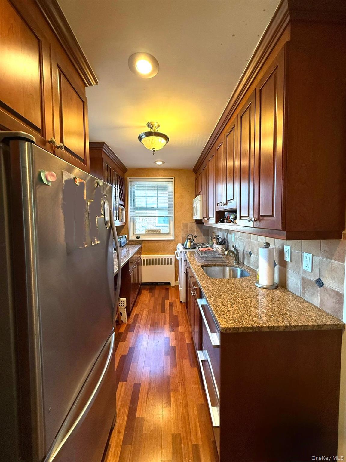 Welcome to Deepdale Gardens 2/3 bedroom Upper unit. Featuring split Ac/heat units, stainless steel appliances in the kitchen, a living room, formal dining room (can be used as 3rd br), attic for storage, 2 bedrooms and 1 bathroom. No flip tax, maintenance includes all utilities (Gas & Electric) and 2 parking sticker. Convenient to shopping plazas, park, highways and transportation. Cats OK! No Subletting! Income requirement at least $61,800 if cash, financing $61,800+20% of loan amount.