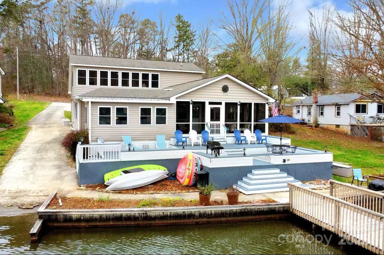 Motivated Seller – Turnkey Lakefront Retreat!
Fully furnished 2,750 sq. ft. lakefront home includes appliances, electronics, and non-motorized water toys. Perfect as a primary residence or vacation getaway. Enjoy a private floating dock, boat ramp, and a two-car garage—ideal for parking or conversion to additional living space. The 22’ pontoon boat is negotiable.  Seller will provide a 1-Year Ultimate Home Warranty. Located near Old North State Club with access to golf, tennis, pickleball, and a fitness center. Close to dining and just 55 min from Charlotte, Winston-Salem, and Greensboro—ideal for weekend getaways or year-round living. 

Don’t miss this rare opportunity for lakefront living!
