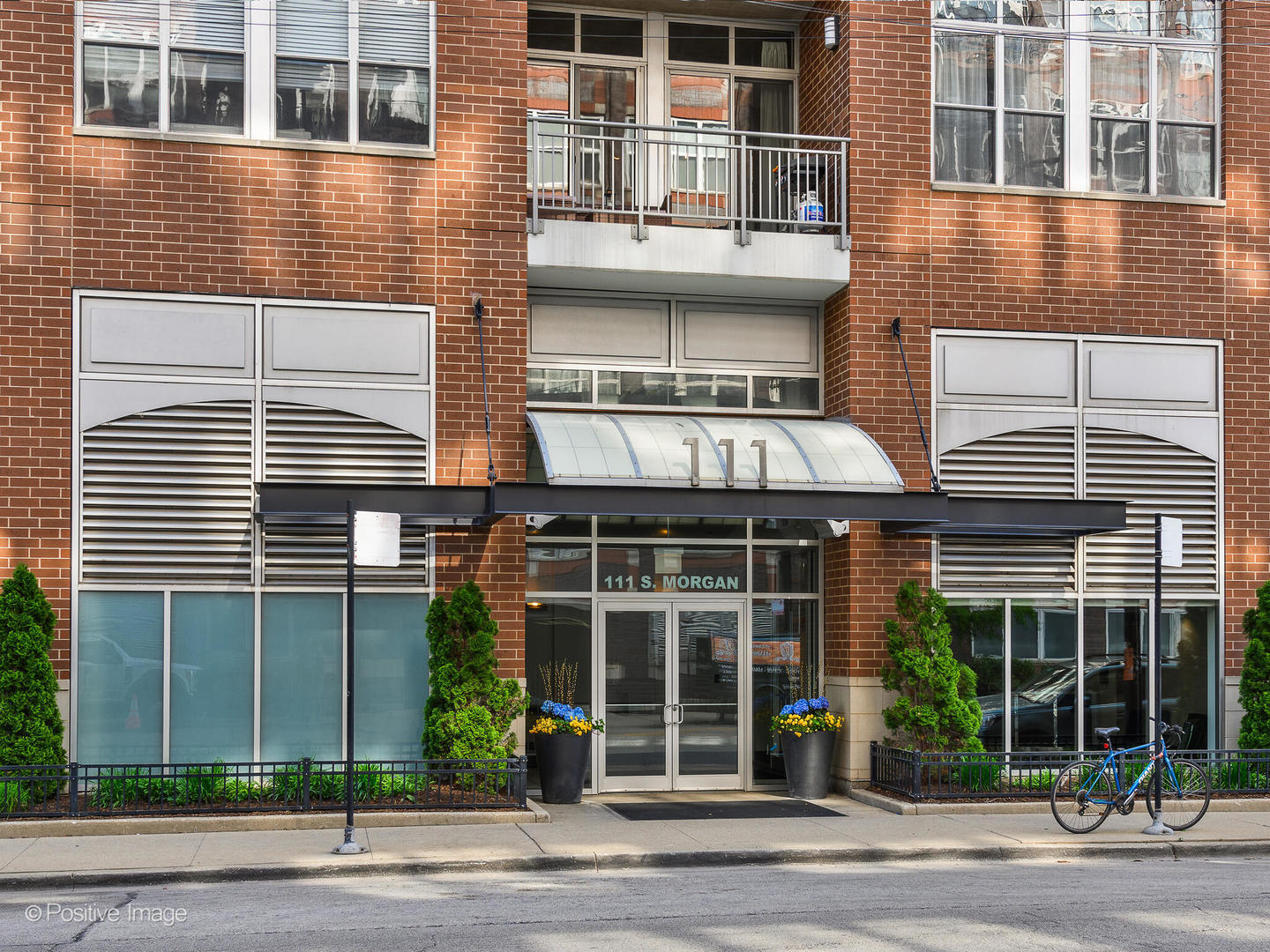 Penthouse Loft in Prime West Loop Location. This spacious 2-bedroom, 2-bathroom penthouse offers the ultimate West Loop lifestyle, complete with two private balconies. Fully turn-key, the home has been thoughtfully updated throughout with wide-plank flooring, fresh paint, new balcony door, and a suite of Samsung appliances. The kitchen showcases 1 1/4" white granite countertops and a stone backsplash for a timeless finish. The fully enclosed primary suite features a spa-like bath with double vanity, separate tub, and shower. Towering concrete ceilings, floor-to-ceiling windows, and exposed ductwork create an impressive loft aesthetic, while massive custom closets and designer window treatments add comfort and function.  Additional highlights include abundant storage, two private balconies perfect for entertaining, and an overall layout designed for both style and convenience. Garage parking.