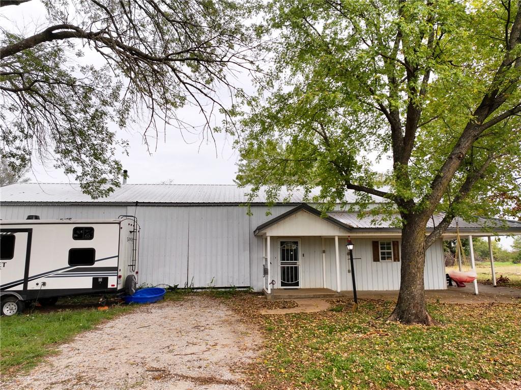 Home For Sale Lamar, MO Discover the possibilities of country living at 238 NW 60th Ln, Lamar, MO! Situated on approximately 35.1± acres in Barton County, this property offers a great opportunity for buyers looking for a home with acreage, room for livestock, or simply a peaceful place to enjoy the outdoors. The approximately 1,700-square-foot home was constructed in 1993 and features a durable metal roof, concrete foundation, and both attached and detached garage parking. Whether you're looking for a country residence, a hobby farm, or a property to make your own, this location offers plenty of potential. Home For Sale Barton County, MO Located in the countryside northwest of Lamar, this property provides the space and flexibility that make rural Missouri living so appealing. With approximately 35.1± acres, there is room to explore a variety of agricultural and recreational possibilities. Buyers looking to establish a small livestock operation, enjoy outdoor activities, or simply have additional space between neighbors will appreciate the opportunities this acreage provides. The existing garage spaces offer convenient parking and storage for vehicles, tools, and equipment. Land For Sale Lamar, MO Finding a home with this amount of acreage creates opportunities that smaller residential properties simply cannot offer. Whether your interests include farming, recreational use, or creating your own country retreat, this Barton County property deserves a look. The Lamar area offers access to local shopping, restaurants, schools, and everyday conveniences while maintaining the rural character southwest Missouri is known for. With access to surrounding communities such as Nevada, Carthage, and Joplin, this property combines country living with regional convenience. Come explore the potential of this 35.1-acre property and imagine what you could make of it!