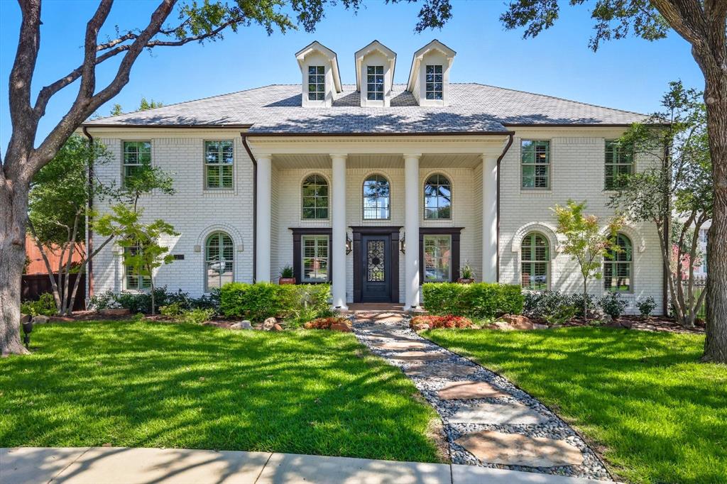 **Stunning 5-Bedroom Home with Pool and Outdoor Living in Hackberry Creek** Experience the perfect blend of style, comfort, and flexibility in this gorgeous five-bedroom home, ideally located in the gated golf course community of Hackberry Creek. The downstairs primary suite is a true retreat with two walk-in closets, an oversized step-in stone-tile shower with dual shower heads, Saltillo tile flooring, and a large dual-sink vanity. The chef’s kitchen was built to impress, featuring a commercial-grade gas cooktop with double ovens on a large butcher block island with bar seating. Other features include granite countertops, a copper farm sink, wine refrigerator, a Sonic-style ice maker, and more bar seating that flows into the open living-dining area. A flex room off the entry featuring custom built-ins offers versatility as a home office or formal dining space. The spacious family room showcases a stone fireplace and dual cast-iron doors with glass inserts that open to the patio-pool, creating seamless indoor-outdoor living. Upstairs, four split bedrooms surround a large game room with pool views. Two bedrooms share a split bath, while the other two connect via a hallway bath—perfect for family or guests. From the main living room, step outside to your backyard oasis with a fenced pool and spa, outdoor kitchen, and covered patio. Off the kitchen, there is another side yard with an oversized pergola, concrete patio, and turf play area - creating multiple options for recreation and entertaining. Practical upgrades include two utility rooms - up and down, two tankless water heaters, and three mini-split cooling units for added comfort in the primary suite, utility room, and garage. The Hackberry Creek community offers 24-7 guarded security, multiple parks and playgrounds, and is part of Coppell ISD’s limited open enrollment program. This move-in-ready home is designed for living, entertaining, and enjoying every moment.