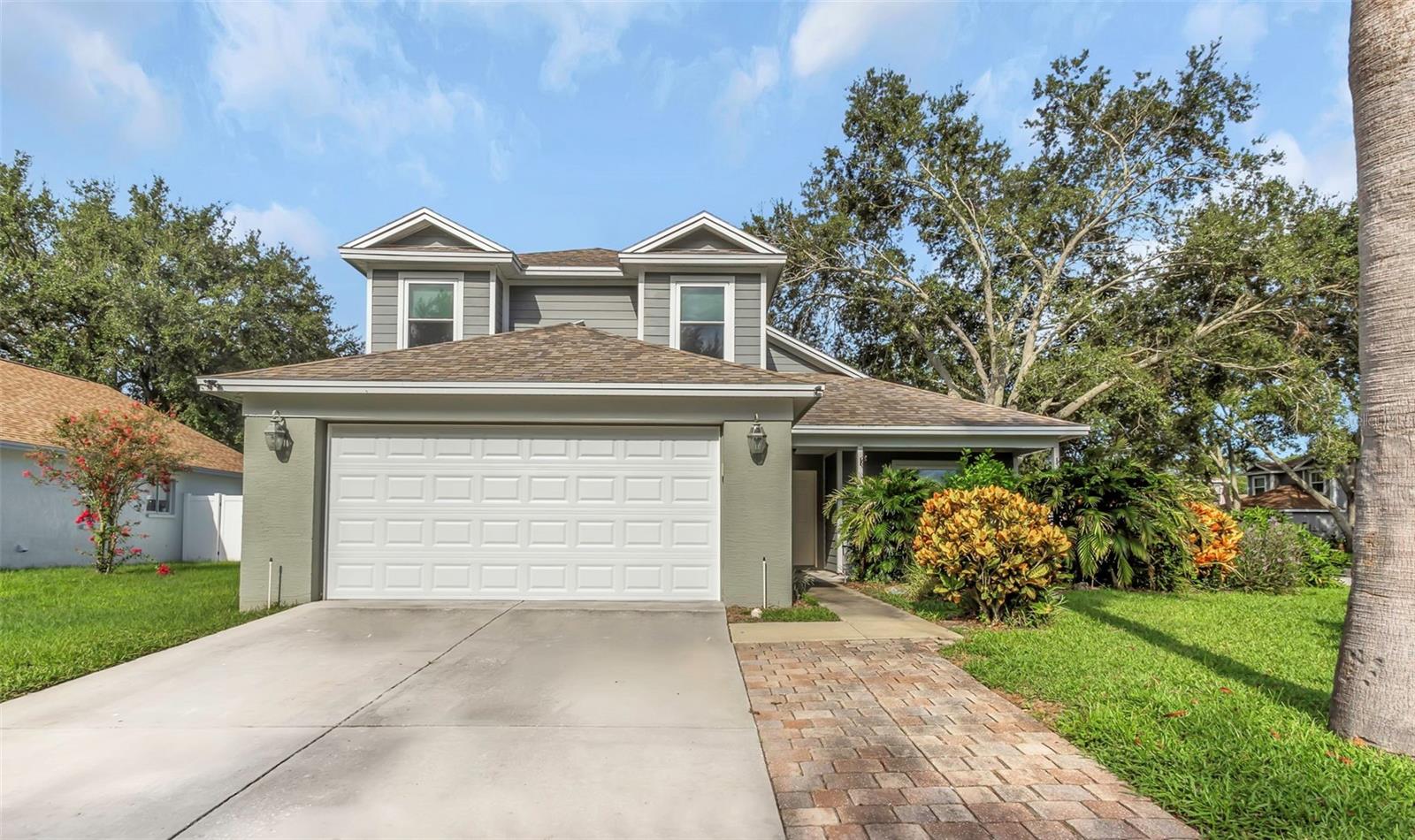 One or more photo(s) has been virtually staged. It’s all about location! Nestled on a desirable corner lot, this home offers space and convenience, with everything you need just minutes away. 

Zoned for top-rated schools; Palm Harbor University, Carwise Middle, and Highland Lakes Elementary. Not to mention, positioned on higher ground in Flood Zone X for extra peace of mind. 

Step inside to the soaring 20 foot vaulted ceilings and oversized windows that bring in natural light to the main level, enhancing the open concept living space. 

The kitchen is complete with shaker cabinets, granite counters, stainless steel appliances, and modern flooring. 

The primary bedroom offers double door entry, a walk-in closet, and an en-suite bathroom with a soaking tub. 

Upstairs, you’ll find three generously sized bedrooms and a full bath with plenty of counter space. 

Outside, enjoy a newly vinyl fenced backyard with a spacious concrete patio, covered lounge area with fan and TV hookup, ideal for entertaining. 

Major updates include new windows (2022), new garage door (2025), vinyl fence (2025), and new baseboards. 

Only one sale in the subdivision in the last year. Don’t miss this rare opportunity, schedule your private showing today!