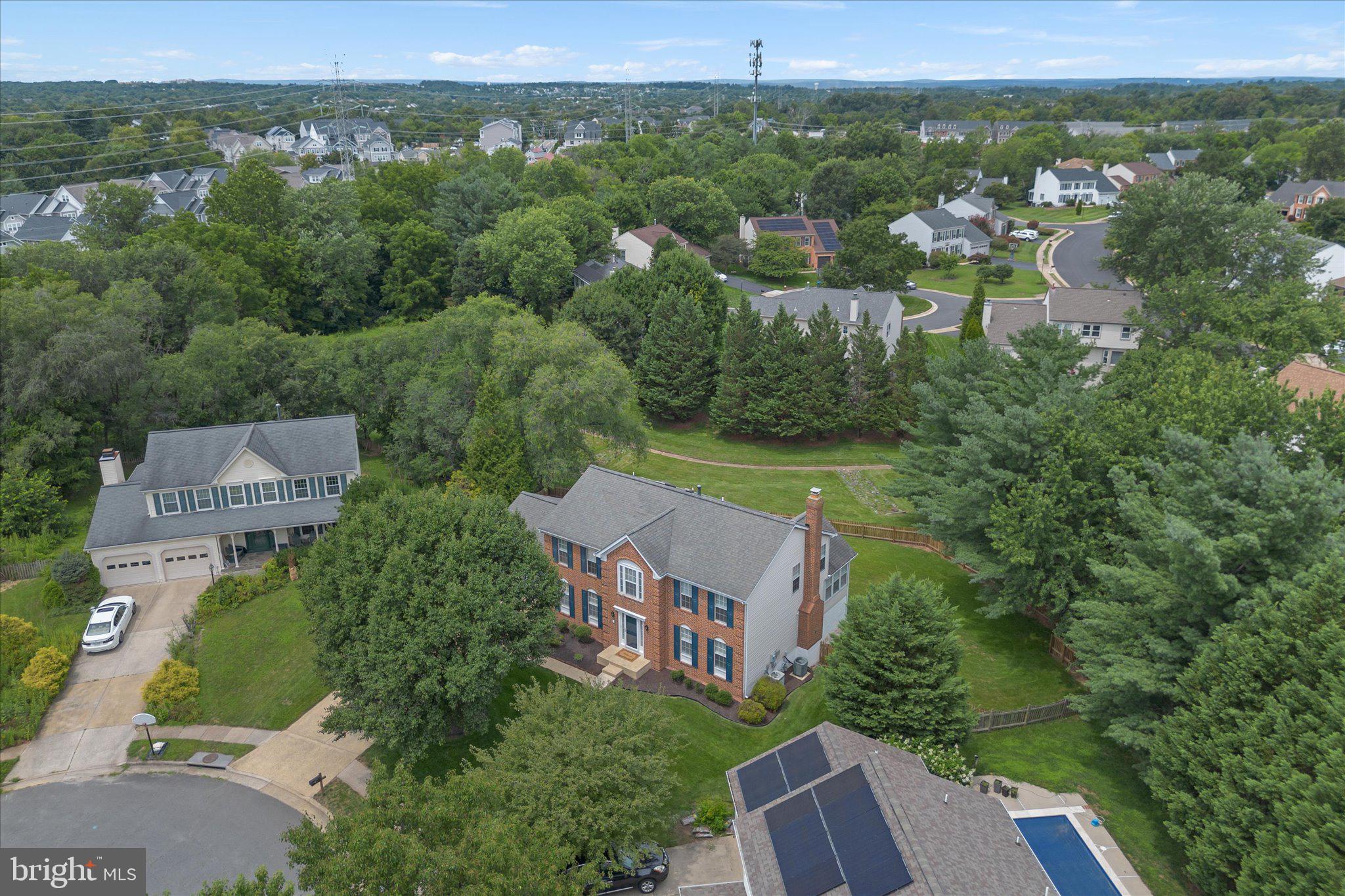 "The Ashburn Village house with the backyard everyone wants." PRIVATE CUL-DE-SAC. PREMIUM 0.30-ACRE LOT. NO HOME DIRECTLY BEHIND YOU.Welcome to one of Ashburn Village's most desirable settings—a beautifully updated 4-bedroom, 3.5-bath home tucked at the end of a quiet cul-de-sac with an unusually large, private backyard and direct access toward the W&OD Trail.With 3,386 finished square feet, a sunroom, finished walkout basement, updated kitchen, new deck, two new HVAC systems and a remodeled basement bath, the expensive projects have already been addressed.But the real surprise is outside: a level, fenced backyard with no house immediately behind it. It's the kind of lot that is increasingly difficult to find in Ashburn.And then there's Ashburn Village—pools, fitness, tennis, trails, lakes, marina and recreation—all included for just $144/month HOA.