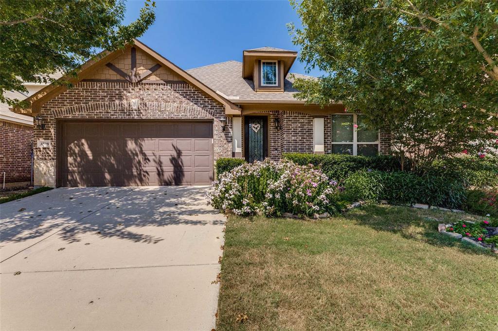 Get ready to come see this fabulous upgraded Bloomfield home in Summer Creek Ranch! It's just gently been lived in and offers all the upgrades you'd want, but don't want to pay for in new construction! Beautiful wood flooring is found throughout the living, dining and kitchen! Adorable frosted glass doors to the fancy utility room and walk-in pantry! High grade cabinetry in pristine condition in the kitchen to include the eat-up island and built-in buffet! Gas cooking for the ones who like to cook! With all this space and the easy flow into the dining and living area, this home is meant for family enjoyment and entertaining! It's the place you'll want to celebrate holidays because there's so much room! The front living area makes a great office or second dining space! The primary bedroom is enormous and includes space for workout, working, or just relaxing! The walk-in closet is amazing, too! Two other bedrooms and a full bath are separated in the rear of the home and the staircase to the upstairs suite is there, as well. So many walk-in closets with another large closet under the stairs! This popular floor plan features an upstairs living area, bedroom and full bath! Perfect for so many situations! But, let's not forget the outside! The drive-up curb appeal is wonderful due to the brick and stone facaad and lovely landscaping! The backyard is also memorable due to the size, landscaping and nice covered porch and deck! All this in such a convenient south Fort Worth location near amenities, schools and the Chisholm Trail Parkway!