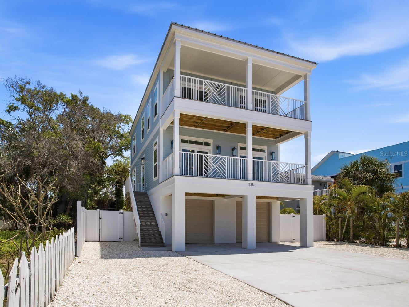 Pre-Construction. To be built. The Battery Point Model is designed to excel in extreme coastal environments. Built with a durable 2x12 floor system and robust 2x6 exterior walls, this elevated coastal home is engineered to withstand winds up to 180 MPH—making it hurricane-proven for resilient waterfront communities like ours. Utilizing advanced Two-site construction methods, the Battery Point can be completed in up to 75% less time than traditional construction, while remaining protected from weather-related delays throughout the building process. The Battery Point offers a smart, low-maintenance layout ideal for full-time coastal living, weekend retreats, or high-performing vacation rentals. Entry begins at the lower level with stair access to the elevated main living space, designed to meet modern flood and coastal code requirements.On the main level, an open-concept living, dining, and kitchen area creates a bright and airy atmosphere, maximizing every square foot. The kitchen flows seamlessly into the living space, making it perfect for entertaining or relaxed coastal living, while direct access to the outdoor porch extends the living area and invites ocean breezes. With 4 well-appointed bedrooms and 3.5 bathrooms, the Battery Point balances comfort and privacy, with both bedrooms featuring a private en-suite bath. A convenient half bath enhances functionality for everyday living and entertaining.