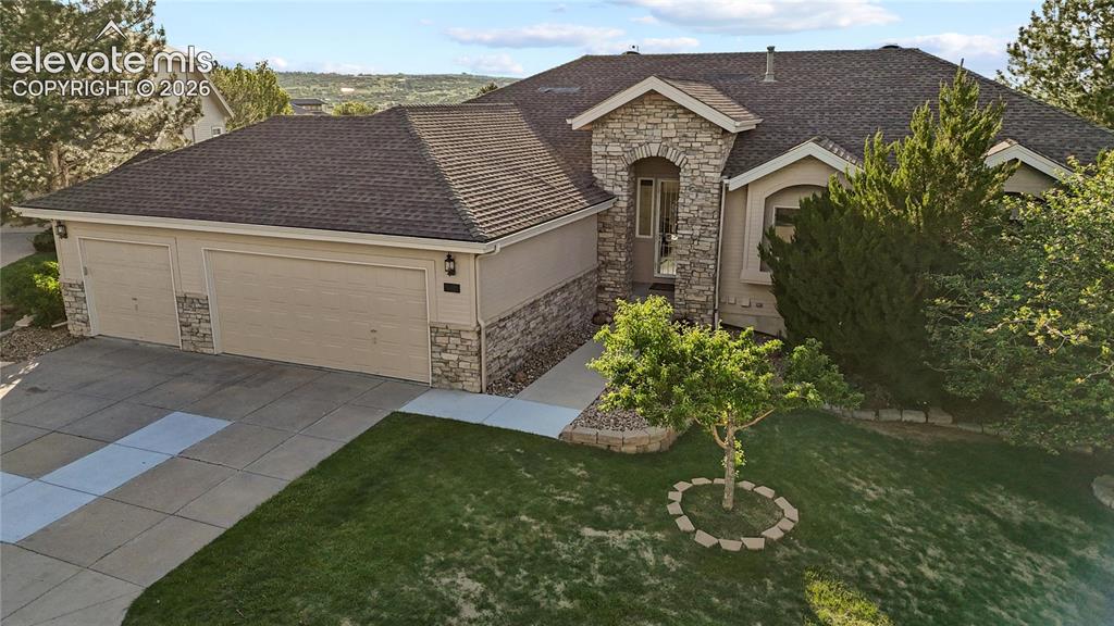 Welcome to one of Castle Rock’s most coveted golf course communities! Nestled in Fairway Vista within Plum Creek, this beautifully updated ranch-style home offers over 3,200 finished square feet, a rare oversized 3-car garage, additional parking pad, and an incredibly versatile layout designed for multi-generational living, entertaining, or future rental potential. The fully finished walk-out basement functions almost as its own private dwelling, complete with a separate exterior entrance from the garage, full secondary kitchen with brand new appliances, dedicated laundry room, oversized living area, bedroom, bathroom, and multiple storage spaces. One of the home’s most unique features is a hidden storage room tucked behind a built-in bookcase — ideal for a private office, library, hobby room, or secure storage space.Recent upgrades and renovations make this home truly move-in ready, including a brand new deck, fresh interior paint throughout, and new carpet on the basement level and stairs. The main level features soaring vaulted ceilings, hardwood floors, granite countertops, spacious living and dining areas, and a private primary suite with a 5-piece bath and walk-in closet. Located in a highly sought-after Castle Rock neighborhood with golf course access, nearby parks and trails, and easy access to shopping, dining, and I-25, this property offers the perfect balance of comfort, flexibility, and location.