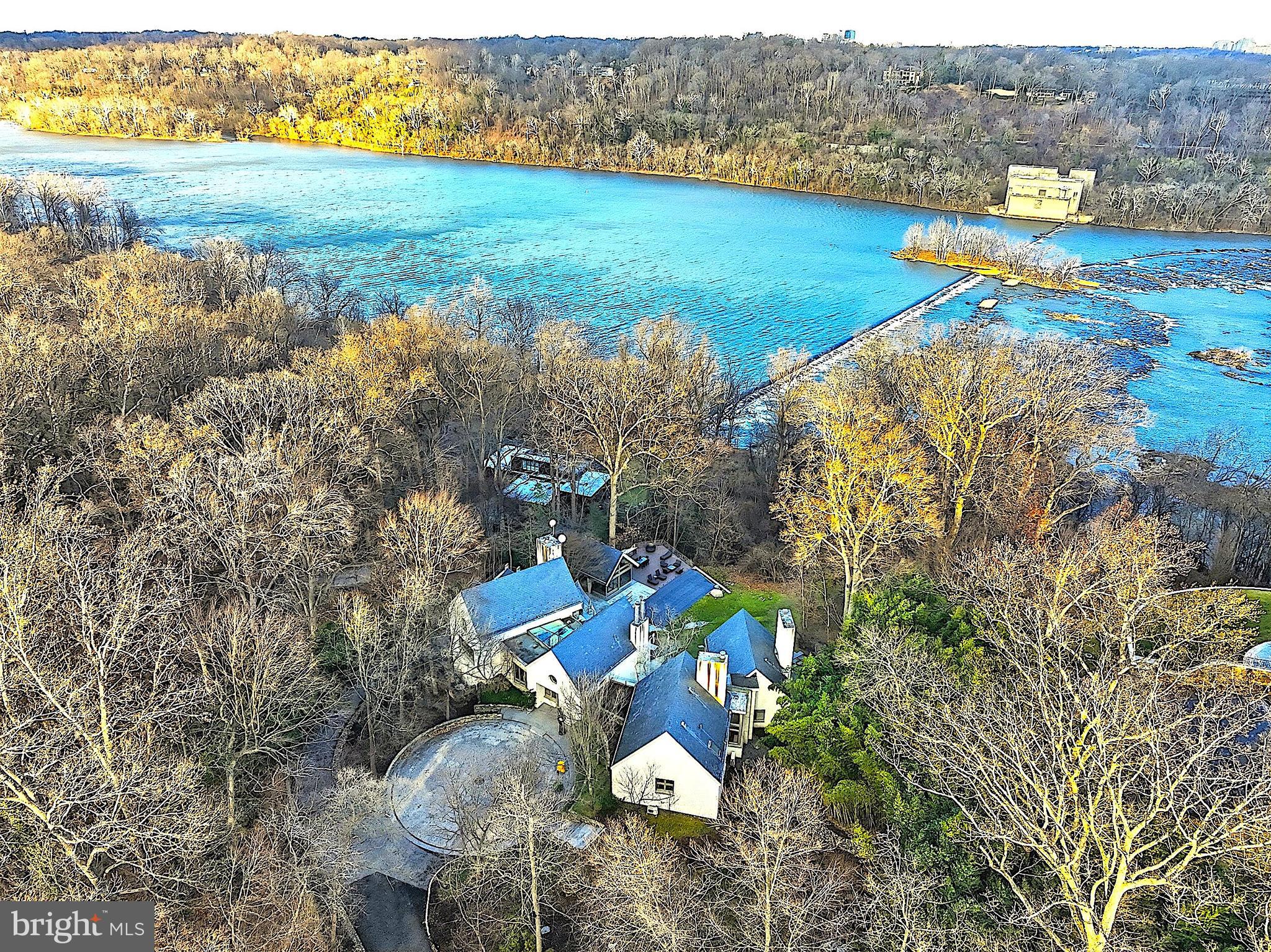 **WATERFRONT ESTATE. This pinnacle estate crowns the hill with unrivaled views of the Potomac River. Situated across 3.64 acres of  sculpted land in revered McLean where LEGACY MEETS LUXURY.  This breathtaking waterfront estate marries timeless architecture with nature in the most beautiful way. Over 8,000 square feet of exquisitely crafted, light filled living spaces that feel both expansive and intimate.   Gracious formal rooms and soaring windows that frame sweeping river vistas at every turn. Outdoors, the property unfolds into manicured lawns and terraces that lead to a show-stopping, resort-caliber pool, complemented by state‑of‑the‑art pool house boasting a private gym with a changing room that includes a shower—perfect for your morning laps or lifting sessions without ever leaving the grounds. Total of 7BR, 6BA and 2 HB. Includes a Wine Cellar, fire places, heated 3 car garage and central vacuum. Also, the garage has extra storage room and its own extra washer/dryer. This breathtaking home has selected limestone, cherry wood, granite and maple. Step through and let the visionary floor plan pull you into spaces that feel refreshed, new—like nothing you’ve stepped into before. River views seem to go on forever, creating a serene backdrop from dawn to dusk and giving the home a rare sense of privacy and escape while still being just minutes from everything.  Located in the prestigious Langley area, this sanctuary enjoys swift access to the world‑class shopping and dining of Tysons Corner Center and Tysons Galleria, as well as major commuter routes and a few miles to downtown Washington, D.C., cultural landmarks etc… Live the unparalleled lifestyle along one of the Capital Region’s most exclusive stretches of riverfront. The listing encompasses both 1100 and 1153 Crest Lane that are 2 lots consolidated into a total of 3.64 acres of prime riverfront grandeur. Please note, the home is in coming soon status and showing will begin this Wednesday the 13th, and it is by appointment to show with 24 hour notice. For your attention, no showings are allowed while in Coming Soon Status.