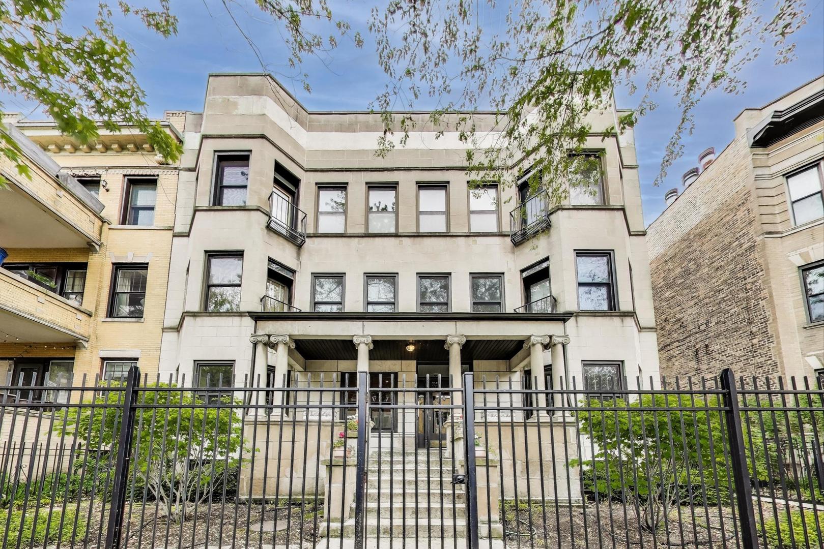 Welcome to this beautifully updated 3-bedroom, 2-bathroom duplex in the heart of Margate Park. This spacious residence combines timeless elegance with luxury upgrades The home's main level is anchored by a generous living room/dining room area centered around a cozy wood-burning fireplace, with rich hardwood floors and natural light. The chef-worthy kitchen is outfitted with premium appliances: a Subzero 36" French door stainless steel refrigerator , Wolf 36" dual fuel range with 4 burners and infrared griddle , Cove dishwasher with water softener , and a Viking exhaust hood with a warming shelf. Granite countertops, abundant cabinetry, and smart layout make this kitchen as functional as it is beautiful. The private primary retreat is located at the back of the home with a wall of closets and an updated bath with marble and porcelain finishes. The second bedroom is perfect for guests or a home office.  The spacious lower level boast a huge family room perfect for movie nights or entertaining with a wall of custom built bookcases and storage. Tucked in the back of the home is  large third bedroom, second bath, storage a laundry area. Additional highlights include Lutron Caseta smart dimmers with hub installed throughout the home in 2023, a Maytag Neptune stacked washer/dryer (gas dryer), and all new breakers and an upgraded electrical panel.  The private rear patio offers a tranquil escape, ideal for morning coffee or al fresco dining. Just beyond, residents enjoy access to beautifully maintained, park-like common grounds with additional seating areas-a rare outdoor amenity in this coveted neighborhood. The deeded garage space includes 240-volt power with a smart splitter, ready for your electric or plug-in hybrid vehicle. This well-appointed, move-in ready duplex offers the perfect blend of historic charm and modern convenience. With the lakefront trail, public transportation, and Uptown's vibrant shops, restaurants, and entertainment venues just outside your door, this Margate Park gem is city living at its finest.