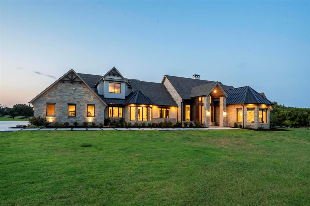 Step into the life, with this 2.5 acre equestrian estate tucked away just yards away from Lake Grapevine in Southlake, TX.  Surround by Corps of Engineer property, and over 6,700 sq ft. of living space, this home offers all your smart home needs in a secluded package just seconds from the trailhead.  Vaulted ceilings, first floor media and gameroom, extensive lighting, and a patio for the ultimate grill master, are just a few of the long list of amenities that went into this well thought out design and finish out.   Although this home is in the middle of the Dallas-Fort Worth metroplex, you'll swear you're country living every time you pull through your gates!