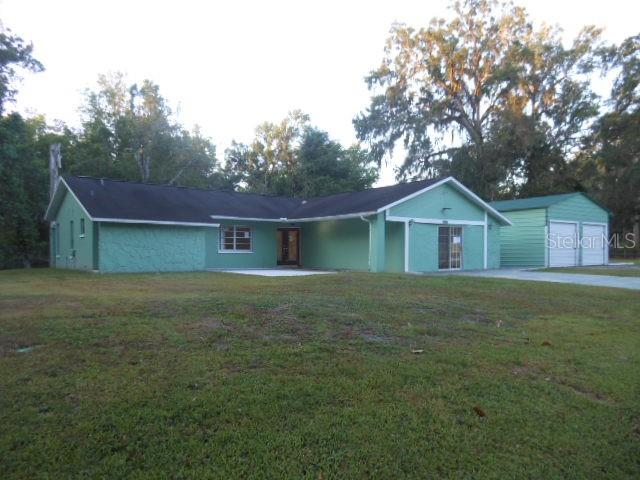 Welcome to the Well Established Candlelight Village Community in the Heart of Brooksville. Built in 1984 this solid Ranch Style stucture is Concrete Block and Stucco. This is the Perfect Base to Build Your Perfect Living Space. The Home shows signs of deferred maintenance and is priced accordingly to invite the savvy investor or the homowner that wants to install interior finishes to suite a more modern lifestyle. You will find a versitile floor plan with a Functional Kitchen that is Open to the Family Room that leads to the Screened Back Porch, A Living Dining Area that opens to the Screened Back Porch, and a Garage Conversion Perfect for a Game Room, Media Room, or Man Cave. The Oversized Lot Features a Patio with Fire Pit/Cooking area and a Spacious Multicar Garage. Convient to Shopping, Dining and Main Highways: 589 Suncoast Parkway, Hwy 41, and I 75. No HOA or CDD and no through traffic. Make this place your Special Living Space.