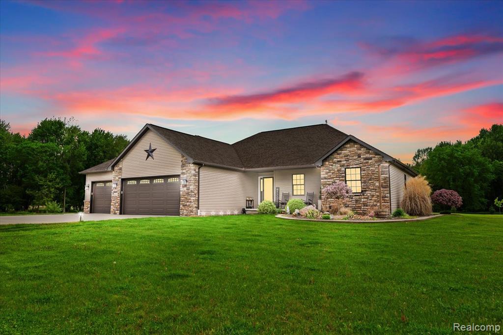 Stunning Ranch on 23.5 Acres with new carpet, paint, a whole house generator & a binzebo! This custom-built 2016 ranch offers the perfect mix of comfort and style on almost 25 private acres. Inside, enjoy brand new carpet, fresh paint, and an open layout with cathedral ceilings. The kitchen features high-end finishes, stainless steel appliances, and a large island with seating. The dining area overlooks the incredible lot which lends itself to lots of deer (5 deer stands included) and other wildlife. The primary suite includes a large walk-in closet and spa-like bathroom with an oversized ceramic tile walk-in shower. A mudroom and first-floor laundry for added convenience. The finished basement offers great additional space for entertaining, hobbies, or a home gym; plus plenty of storage. Outside, you'll love the gorgeous binzebo- a truly unique outdoor feature perfect for relaxing and entertaining. A 24x32' pole barn and oversized 3-car garage provide plenty of storage and space for cars and toys. There is also a Generac 22kw whole house automatic generator. Don't miss this peaceful retreat-schedule your showing today!